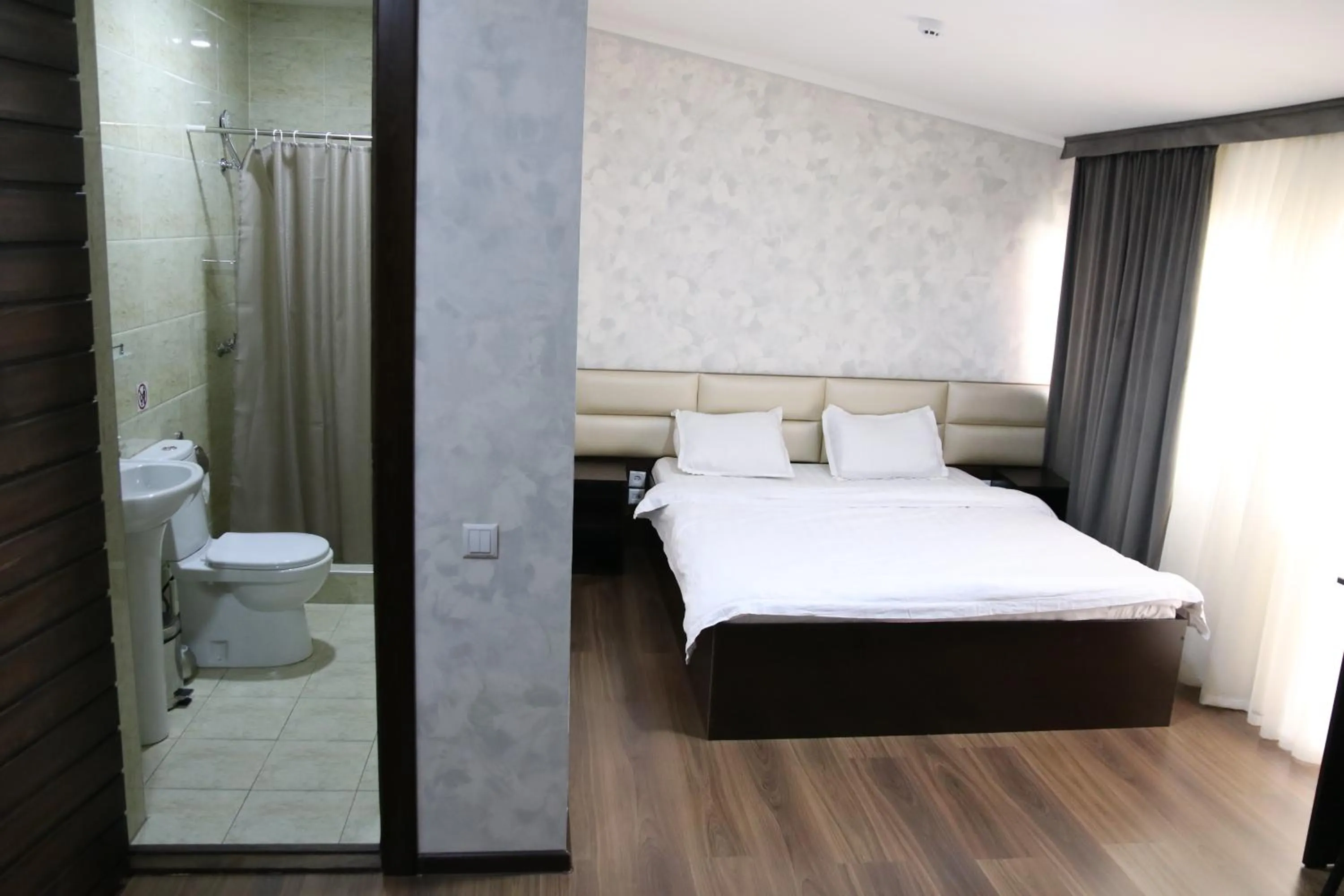 Bed in Orion Hotel Tashkent