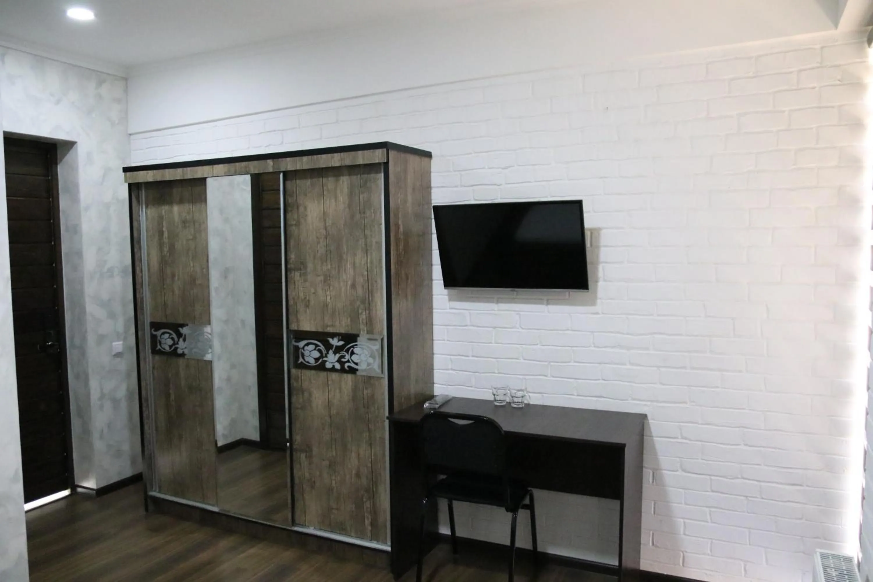 Communal lounge/ TV room in Orion Hotel Tashkent