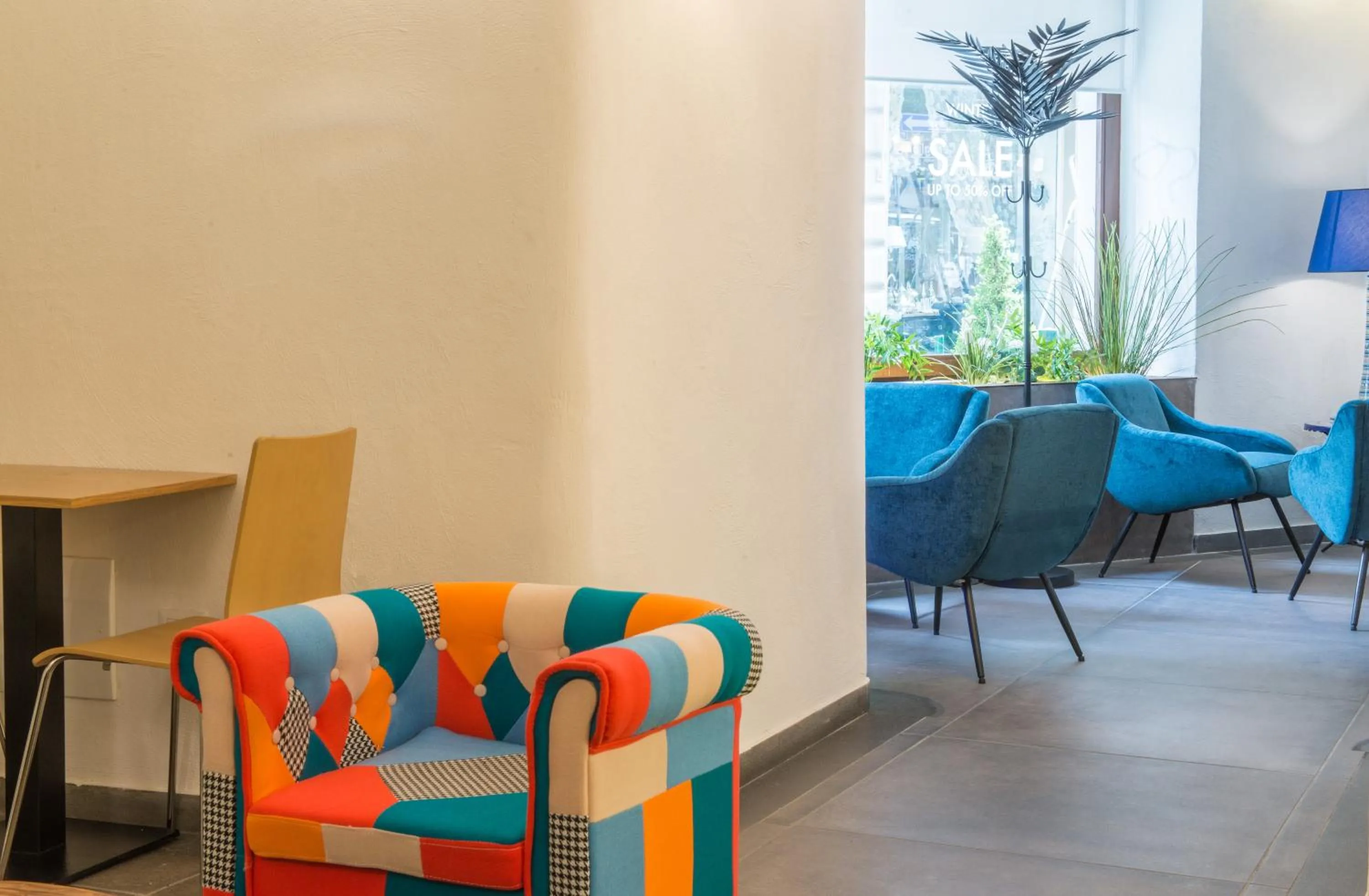 Communal lounge/ TV room in Airone Hotel