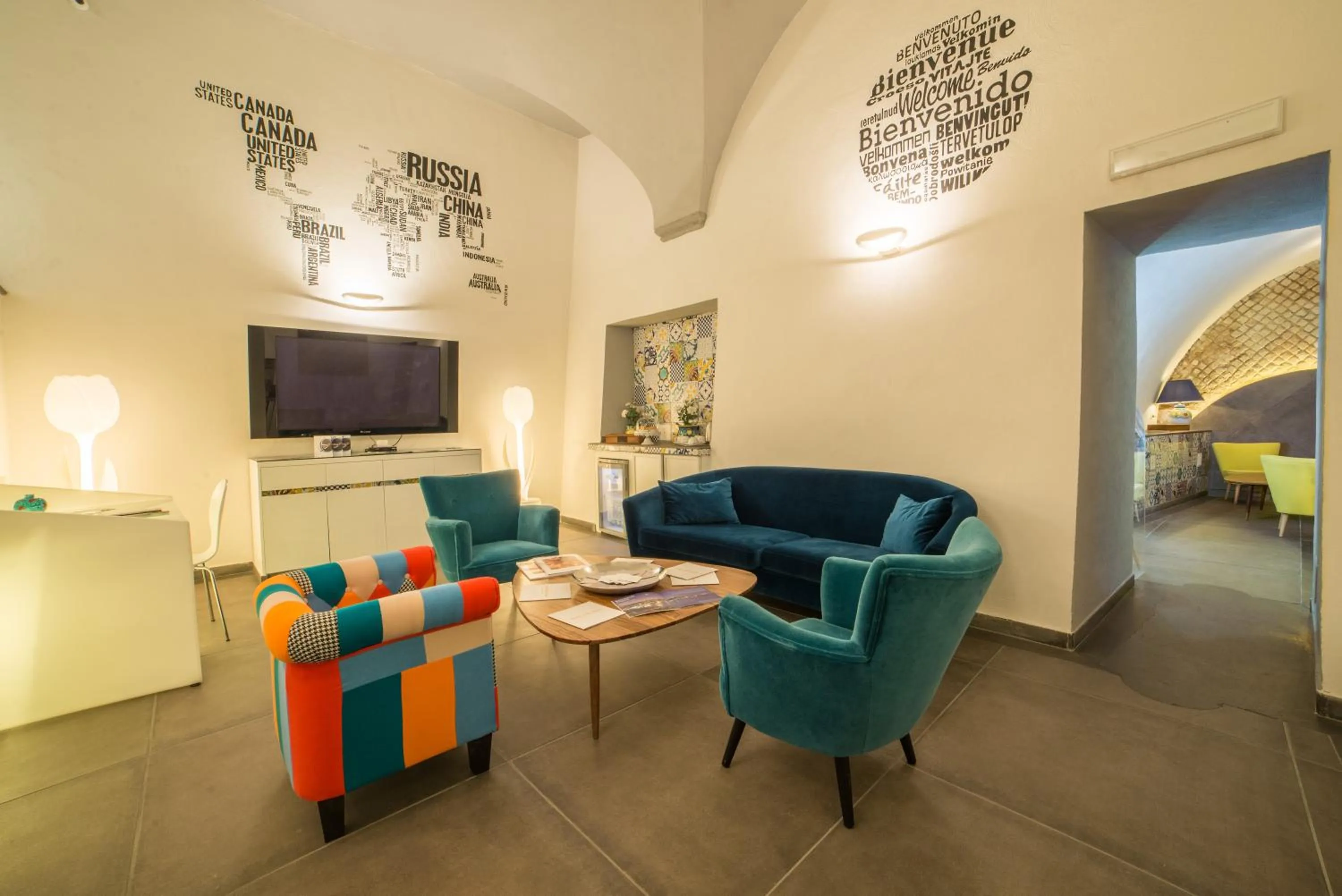 Communal lounge/ TV room in Airone Hotel