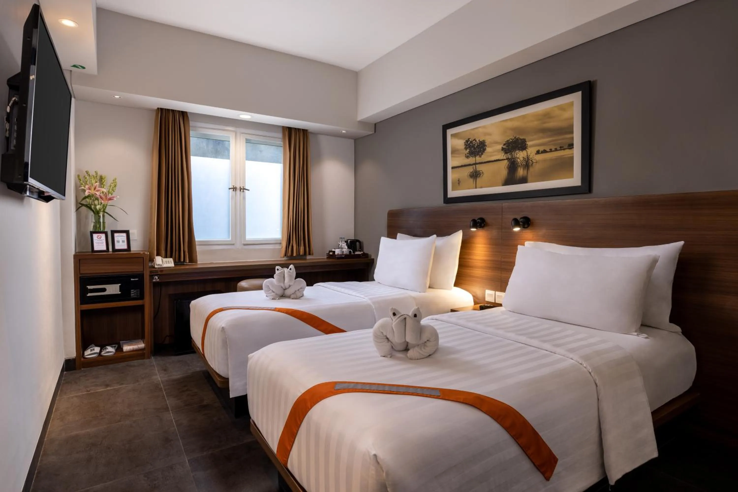 Bed in J4 Hotels Legian