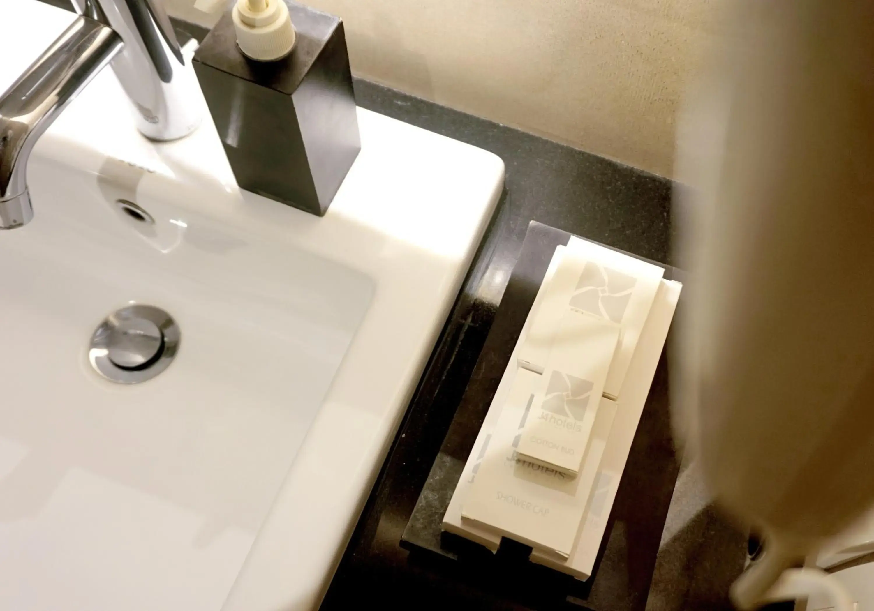 Bathroom in J4 Hotels Legian Bathroom in J4 Hotels Legian