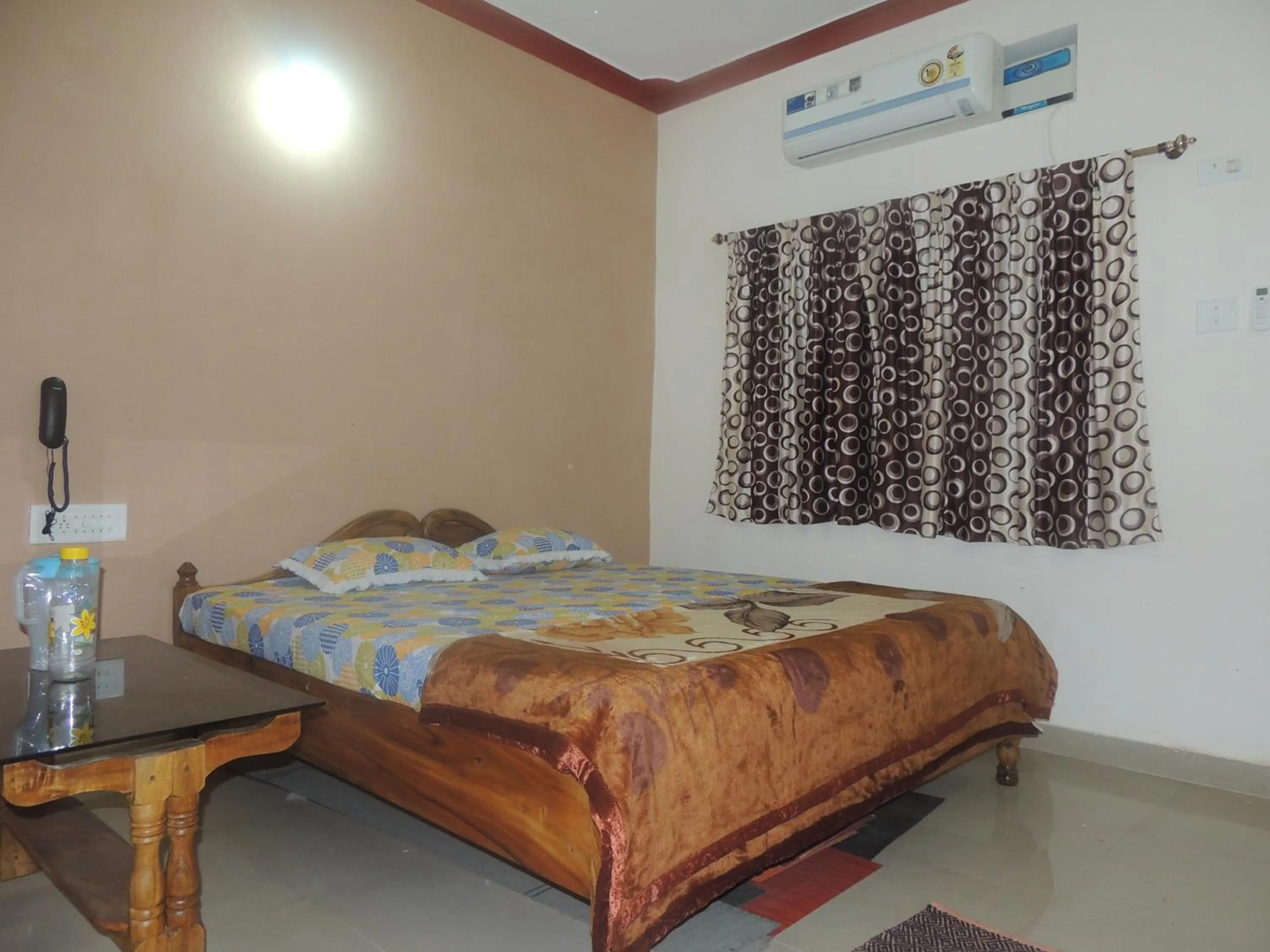 Photo of the whole room, Bed in Surya Inn