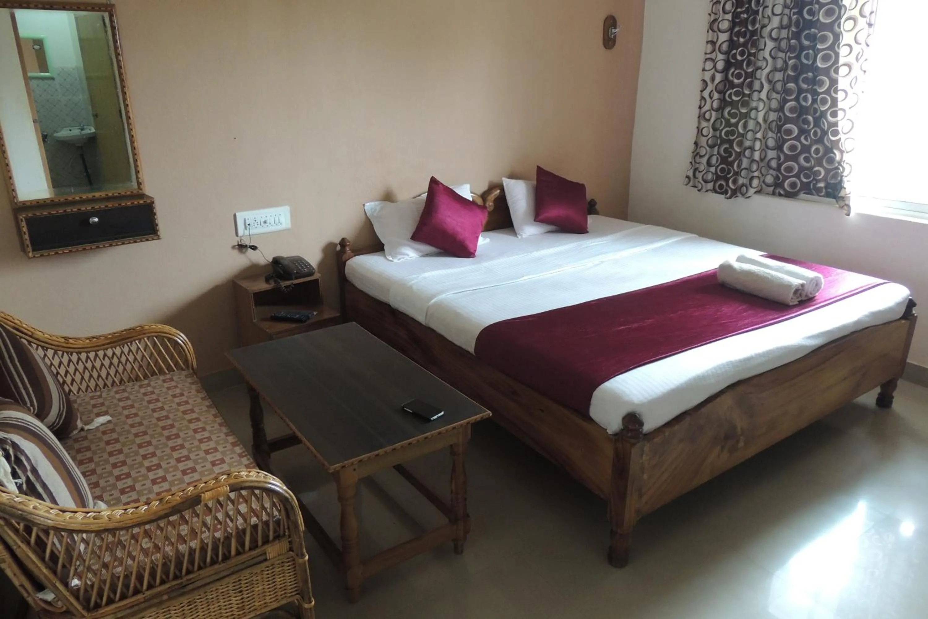 Photo of the whole room, Bed in Surya Inn