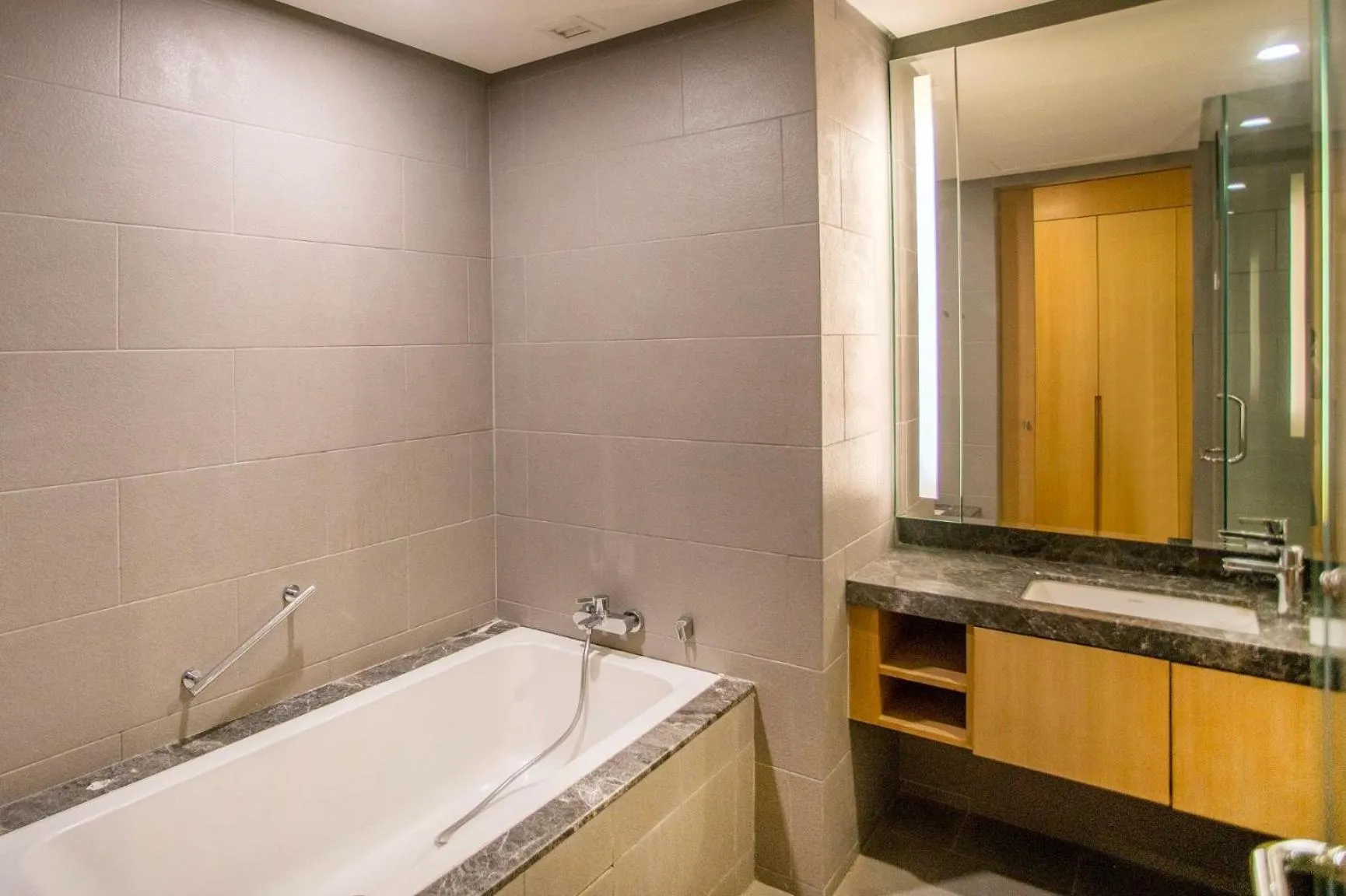 Shower in 188 Suites with Washer and Bathtub near KLCC Kula Lumpur