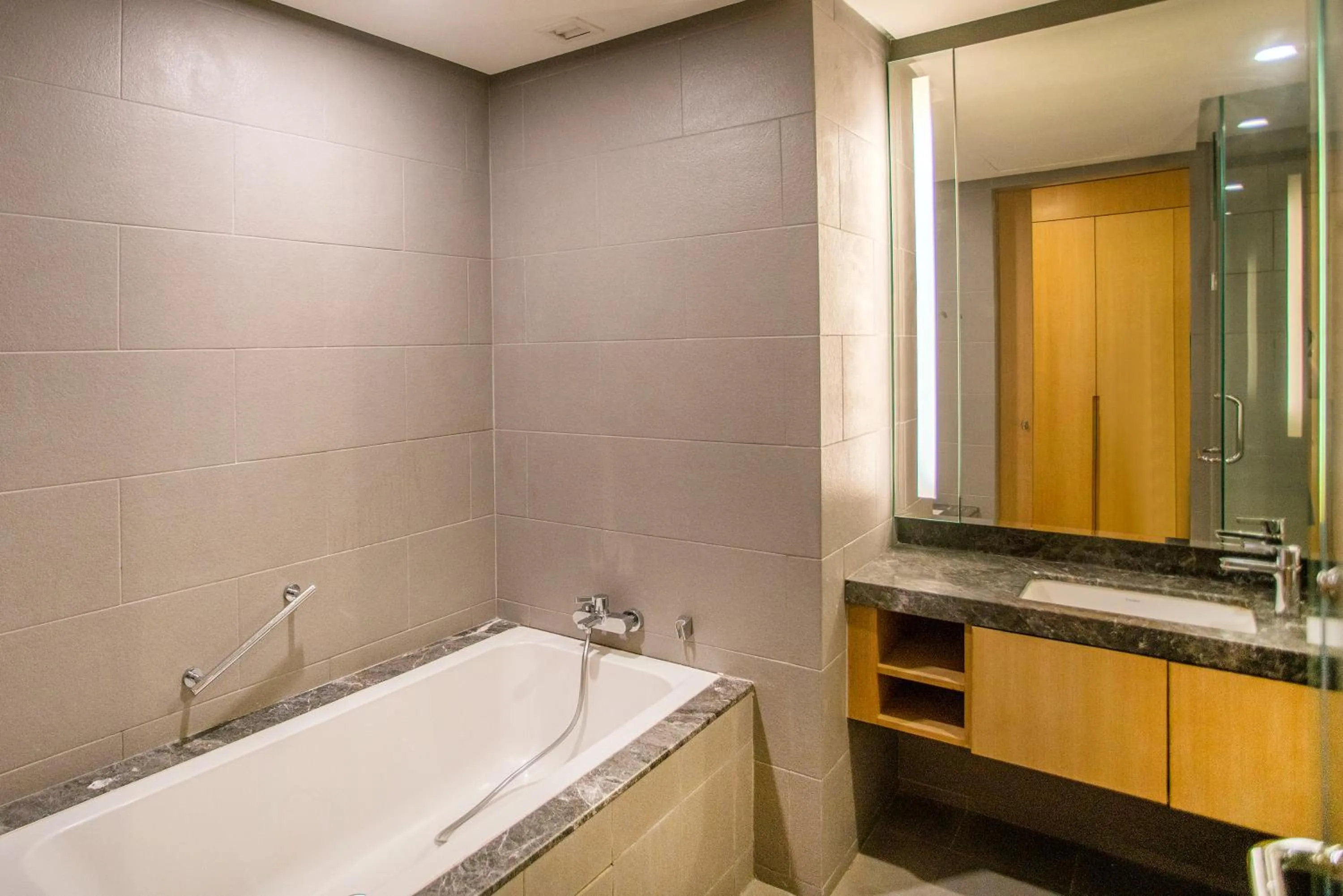 Bathroom in 188 Suites with Washer and Bathtub near KLCC Kula Lumpur