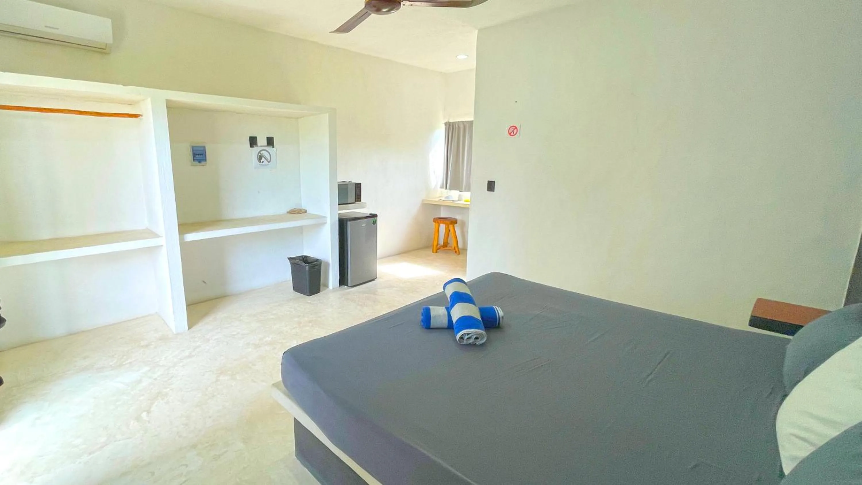 Photo of the whole room, Bed in Casa Tekio Holbox By Kin Studios