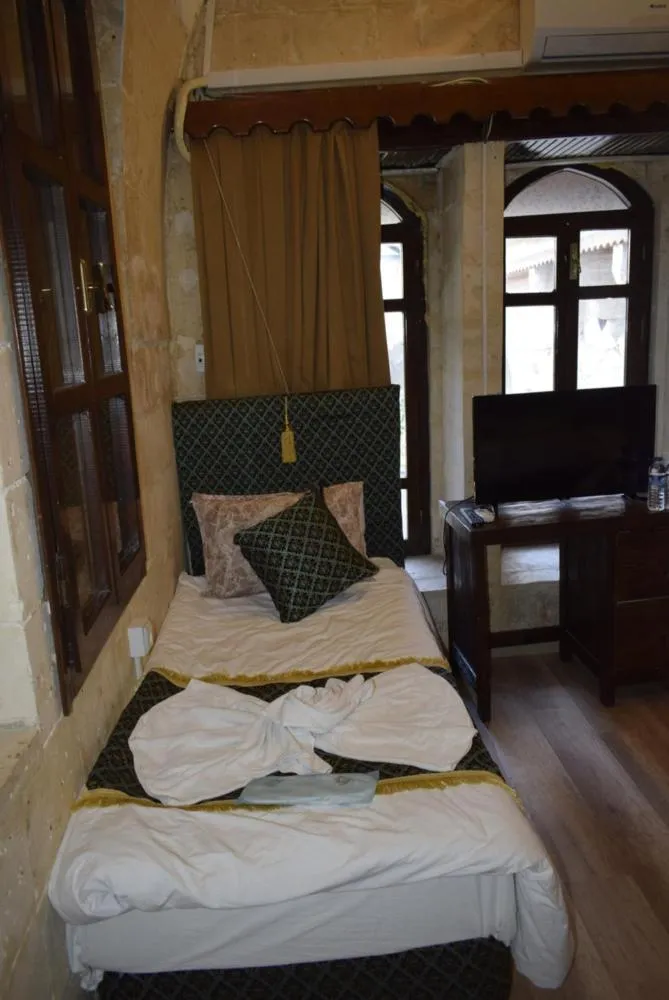 Bed in JOSELİN HOTEL
