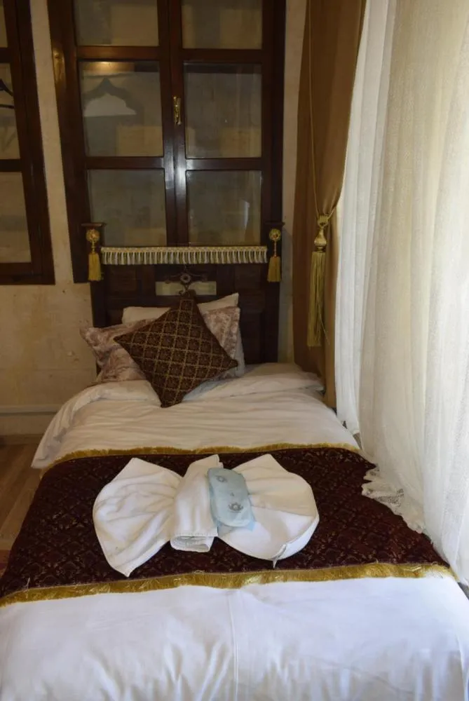 Bed in JOSELİN HOTEL
