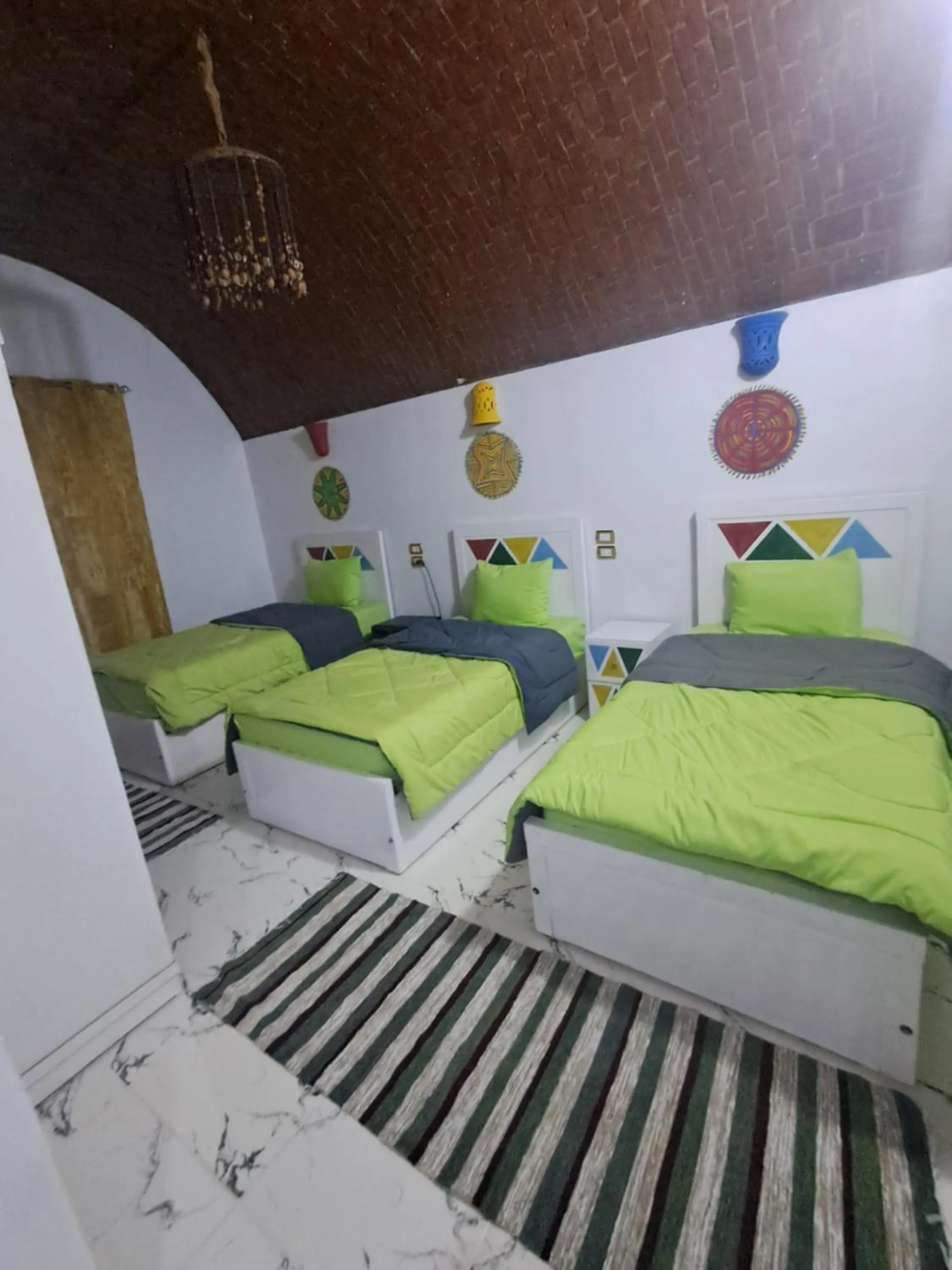 Bed in Lawanda Nubian B&B