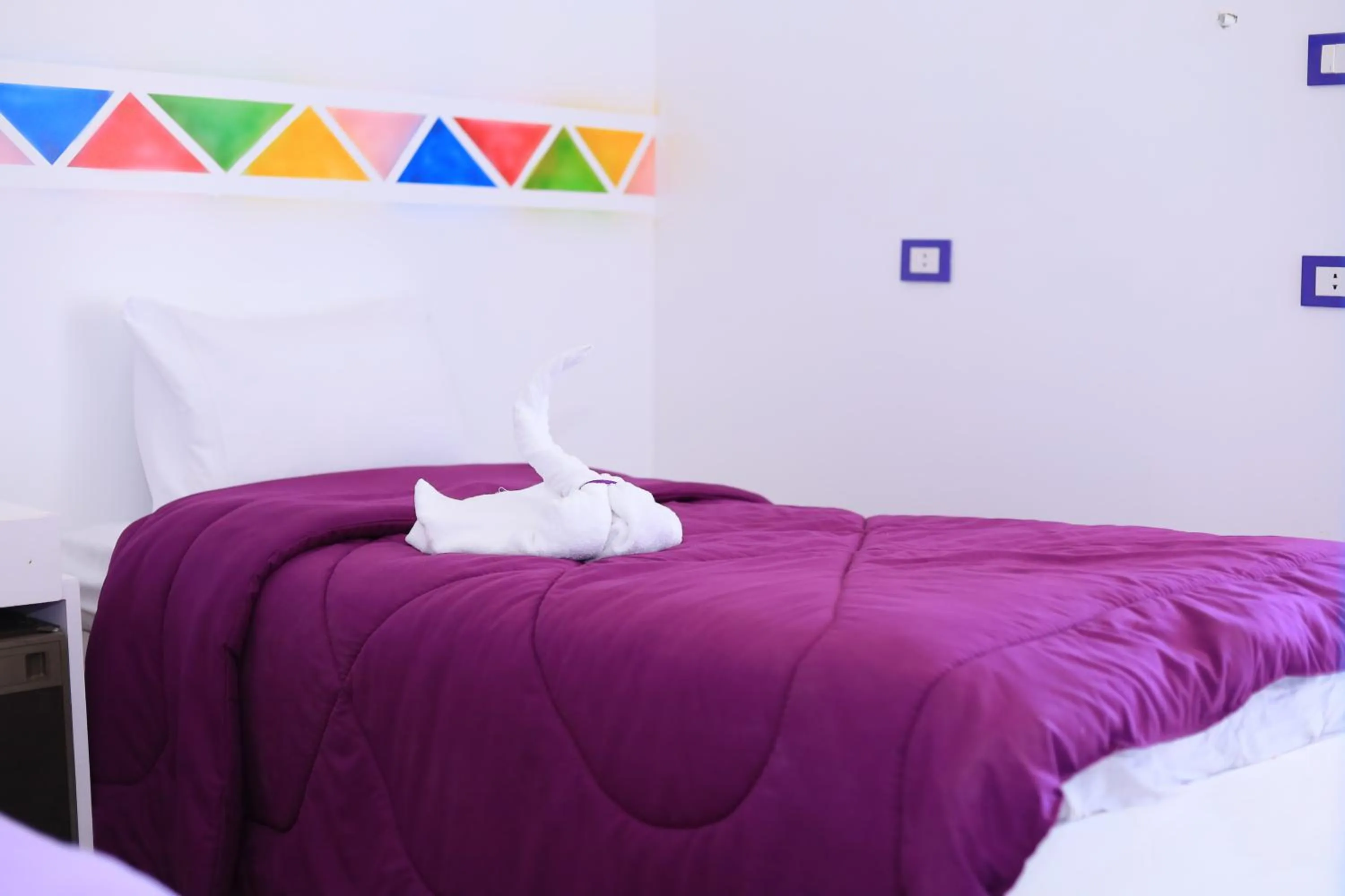 Bed in Lawanda Nubian B&B