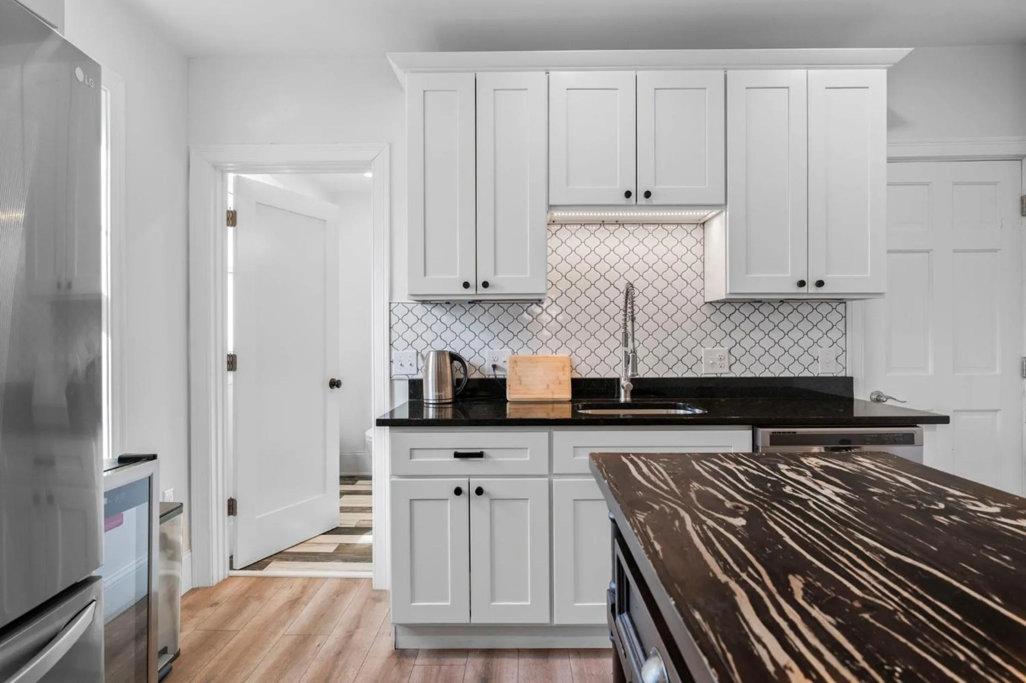 Kitchen or kitchenette in Roslindale village condos