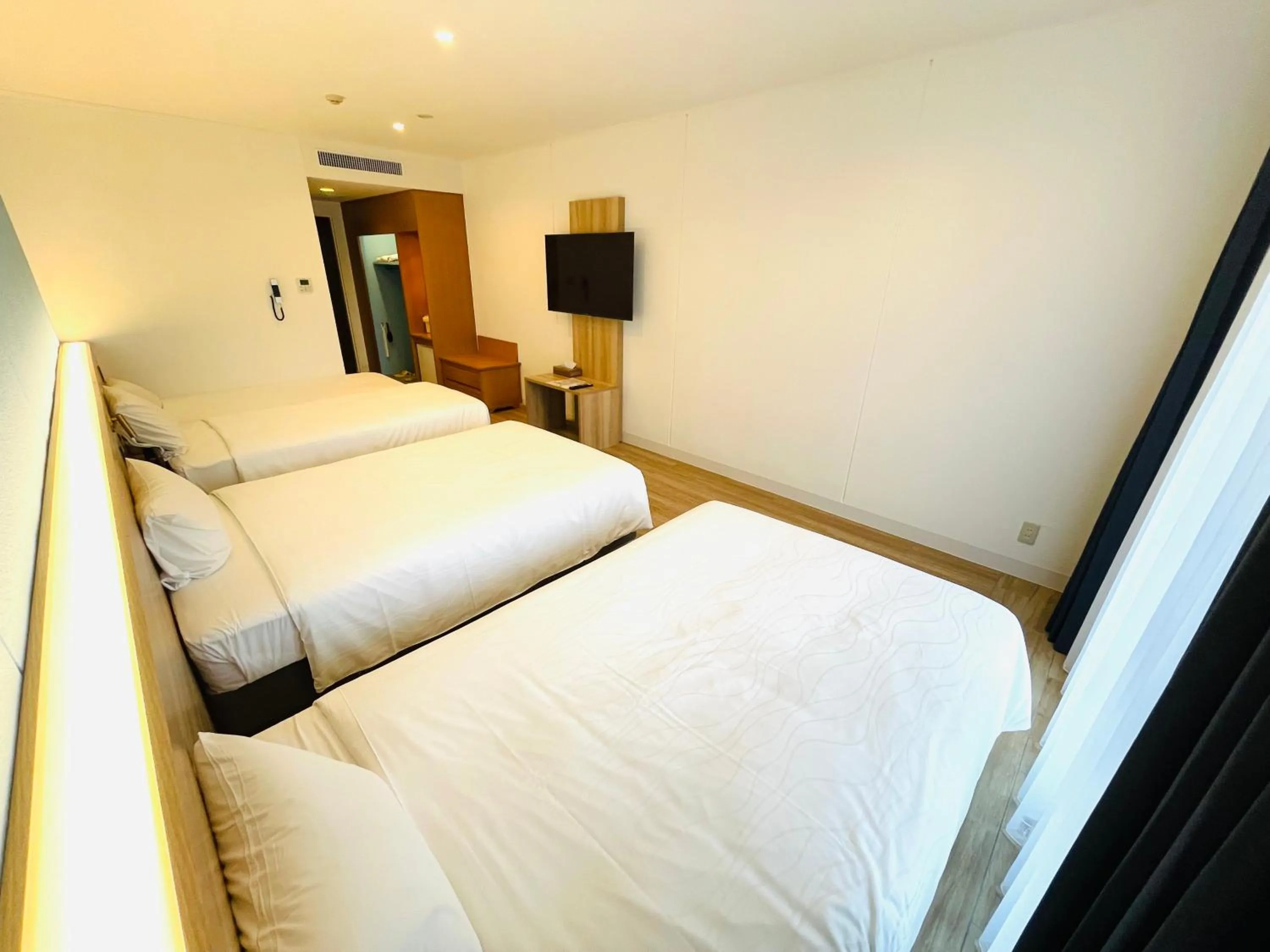 Photo of the whole room, Bed in Watermark Hotel Okinawa Kume Island