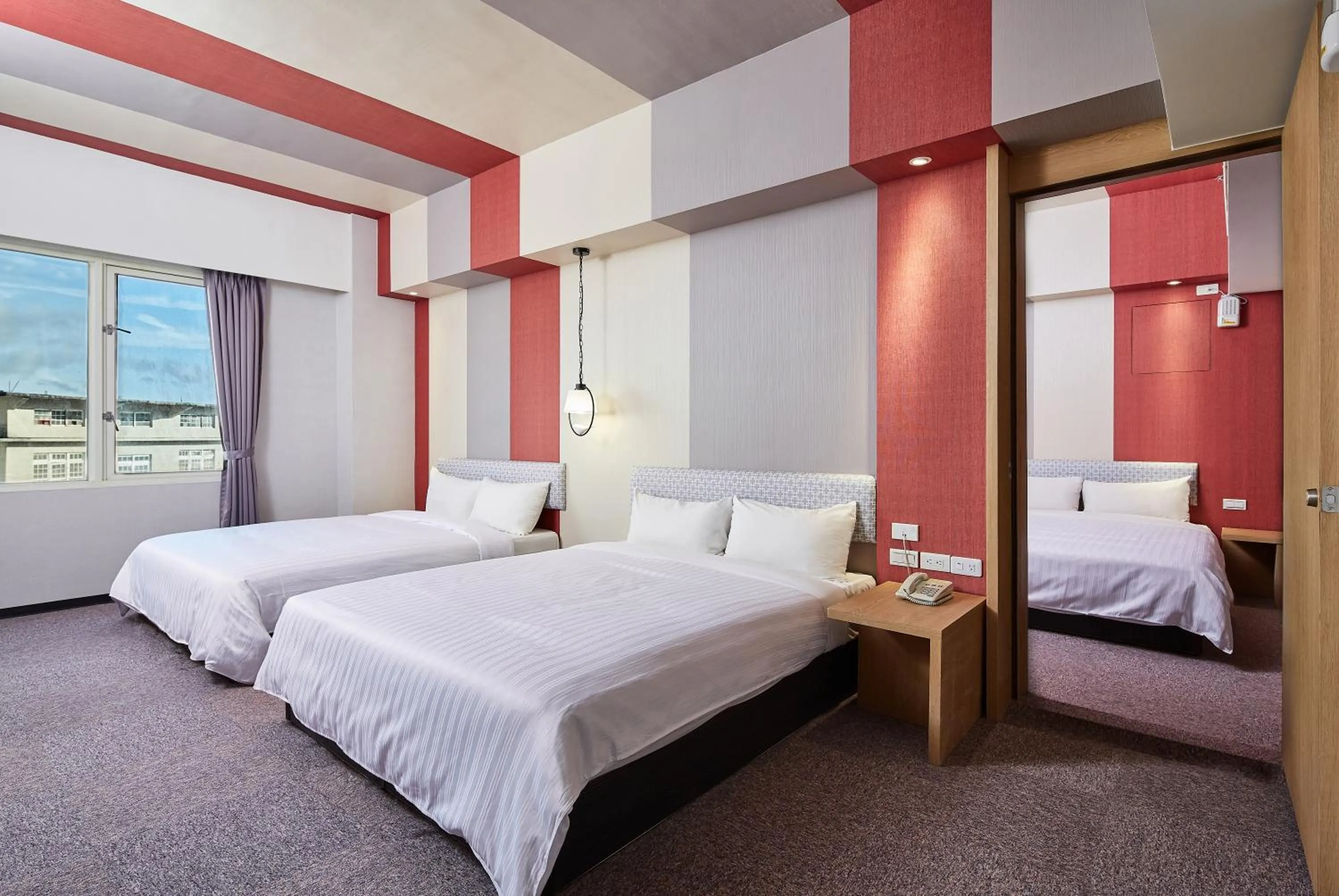 Bed in Kenting City Gate Hotel