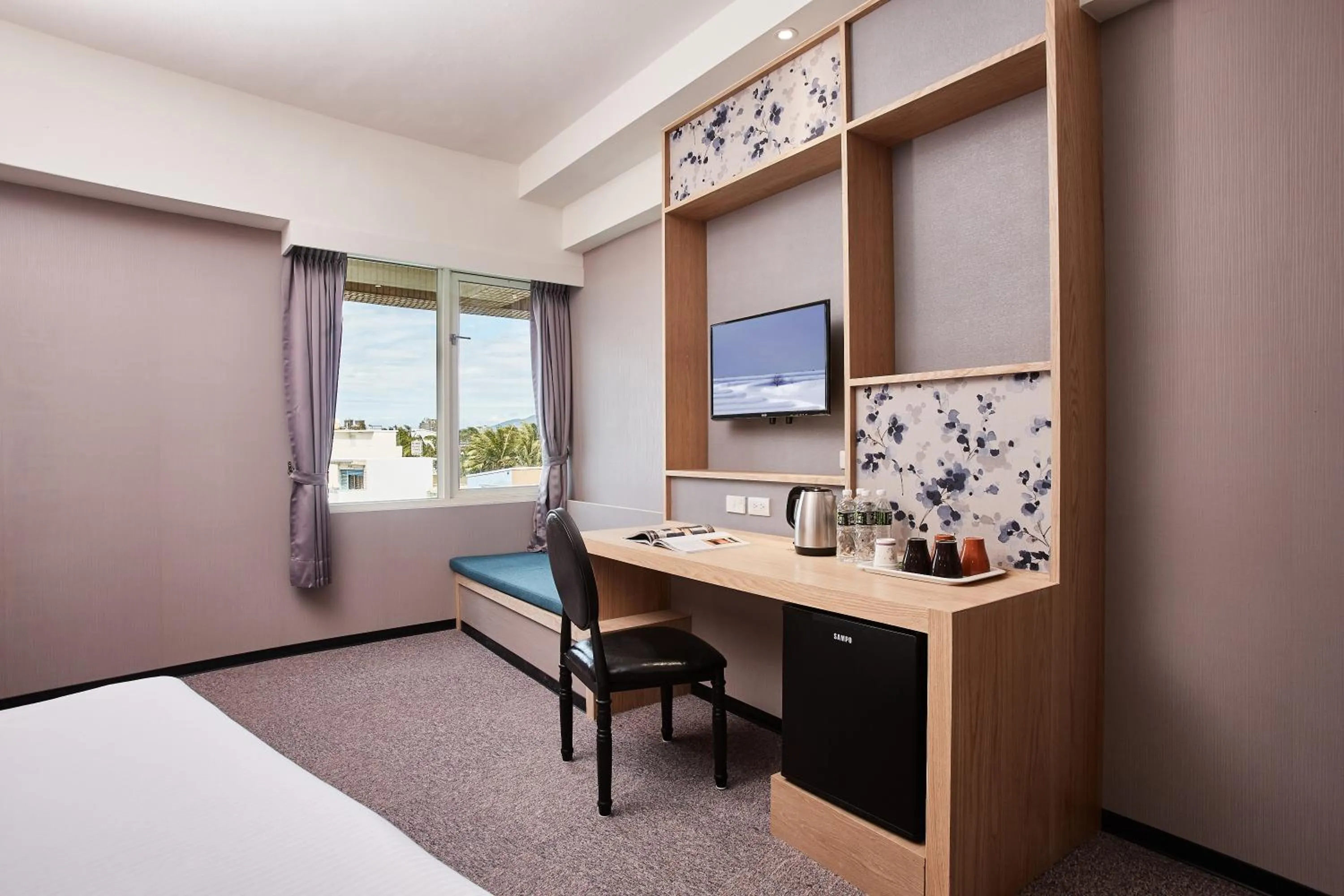 Bed in Kenting City Gate Hotel