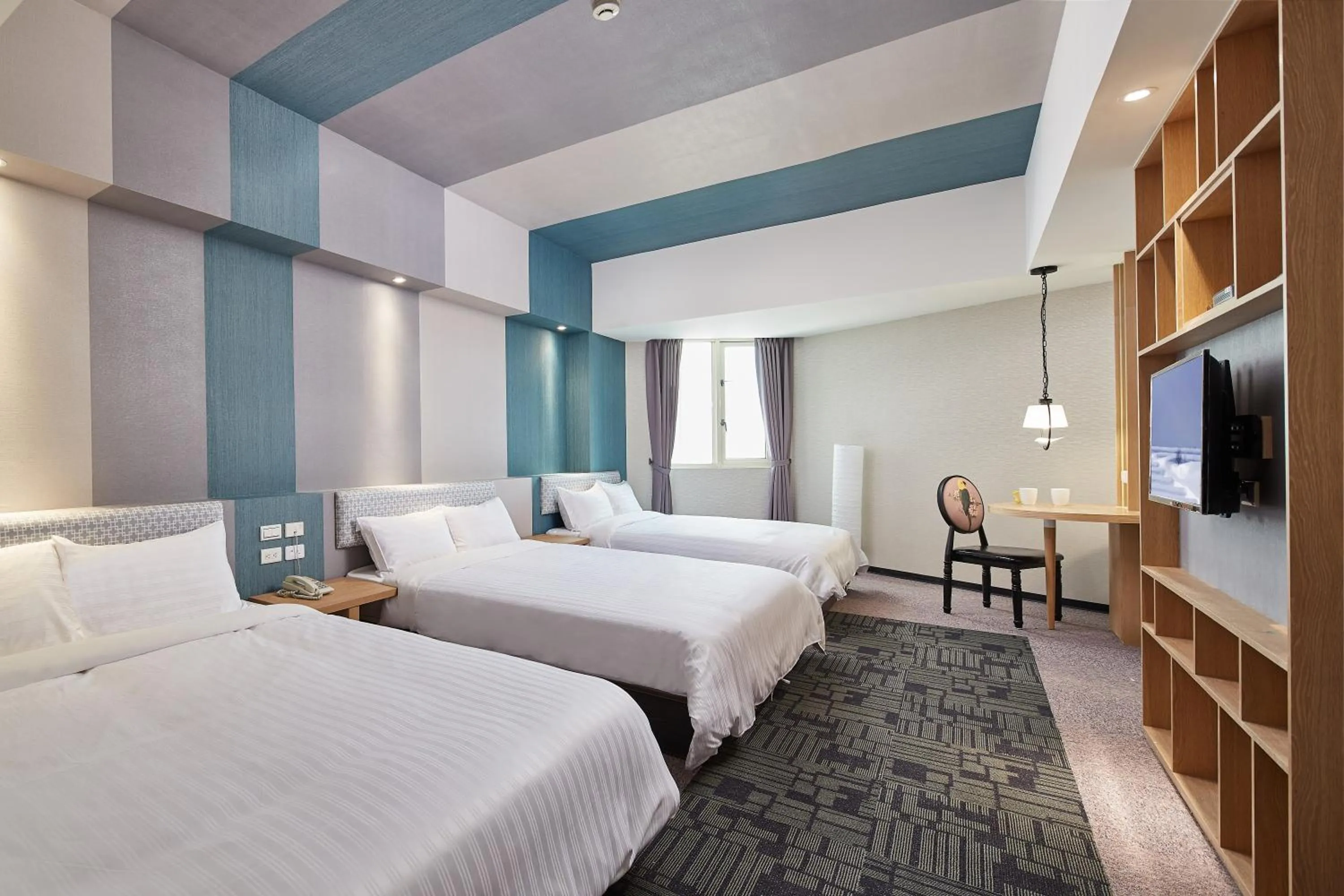 Bed in Kenting City Gate Hotel