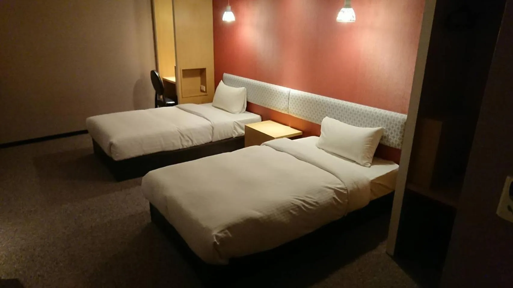 Bed in Kenting City Gate Hotel