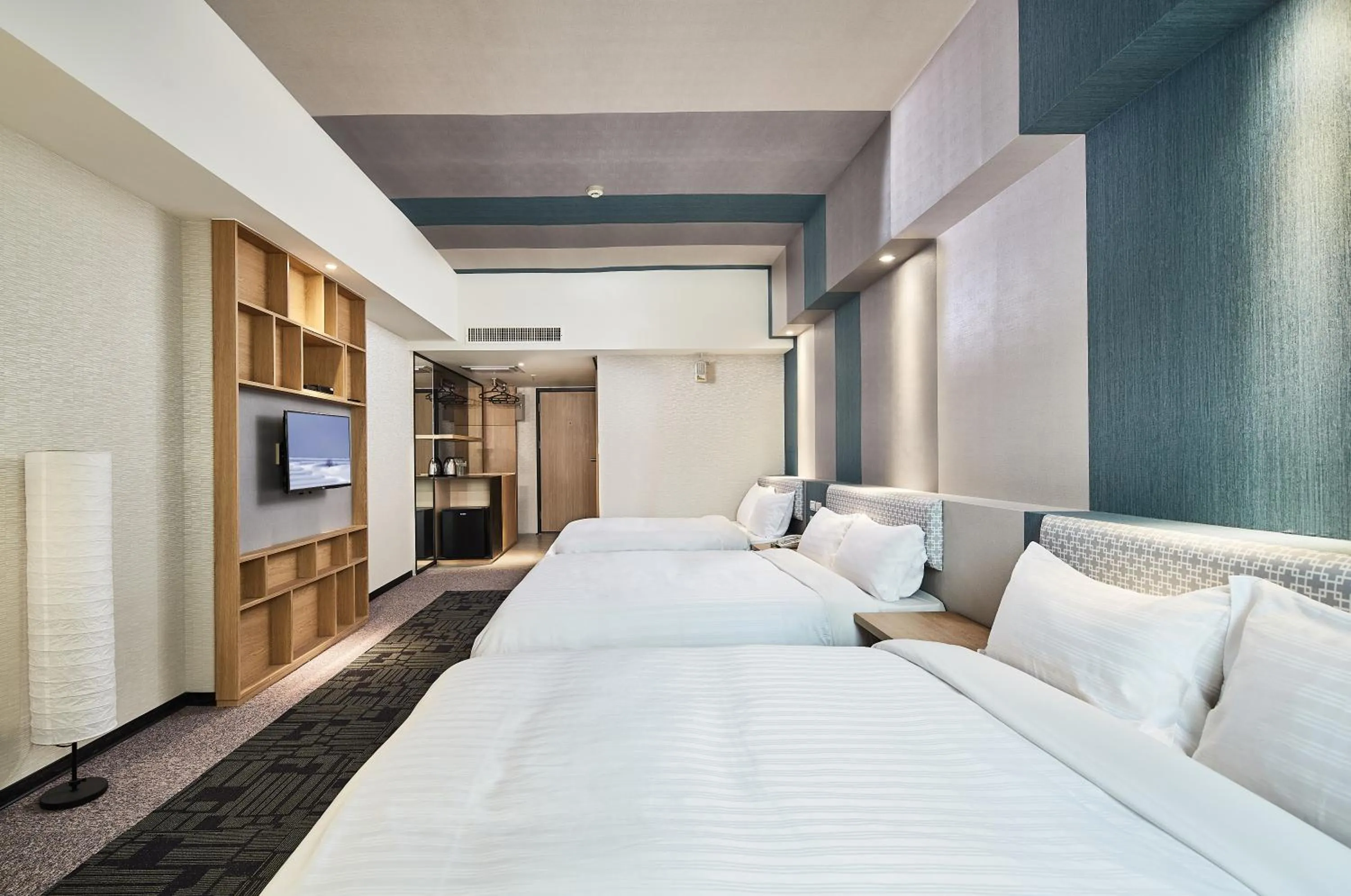 Bed in Kenting City Gate Hotel