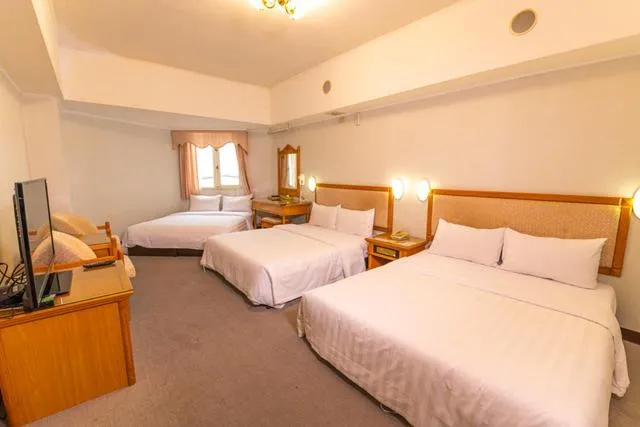 Photo of the whole room, Bed in Kenting City Gate Hotel