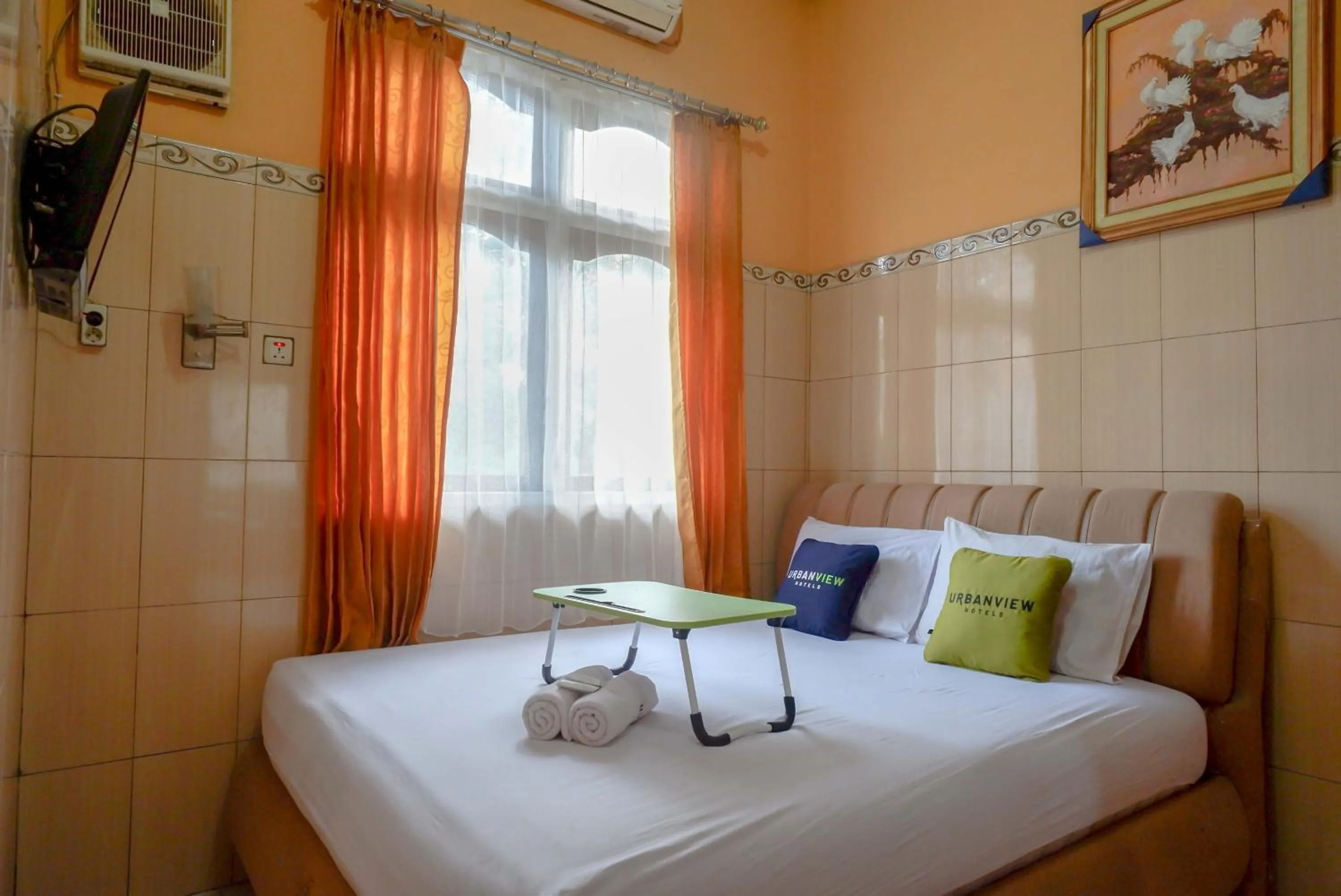 Bed in Urbanview Hotel Anugrah Kendal by RedDoorz