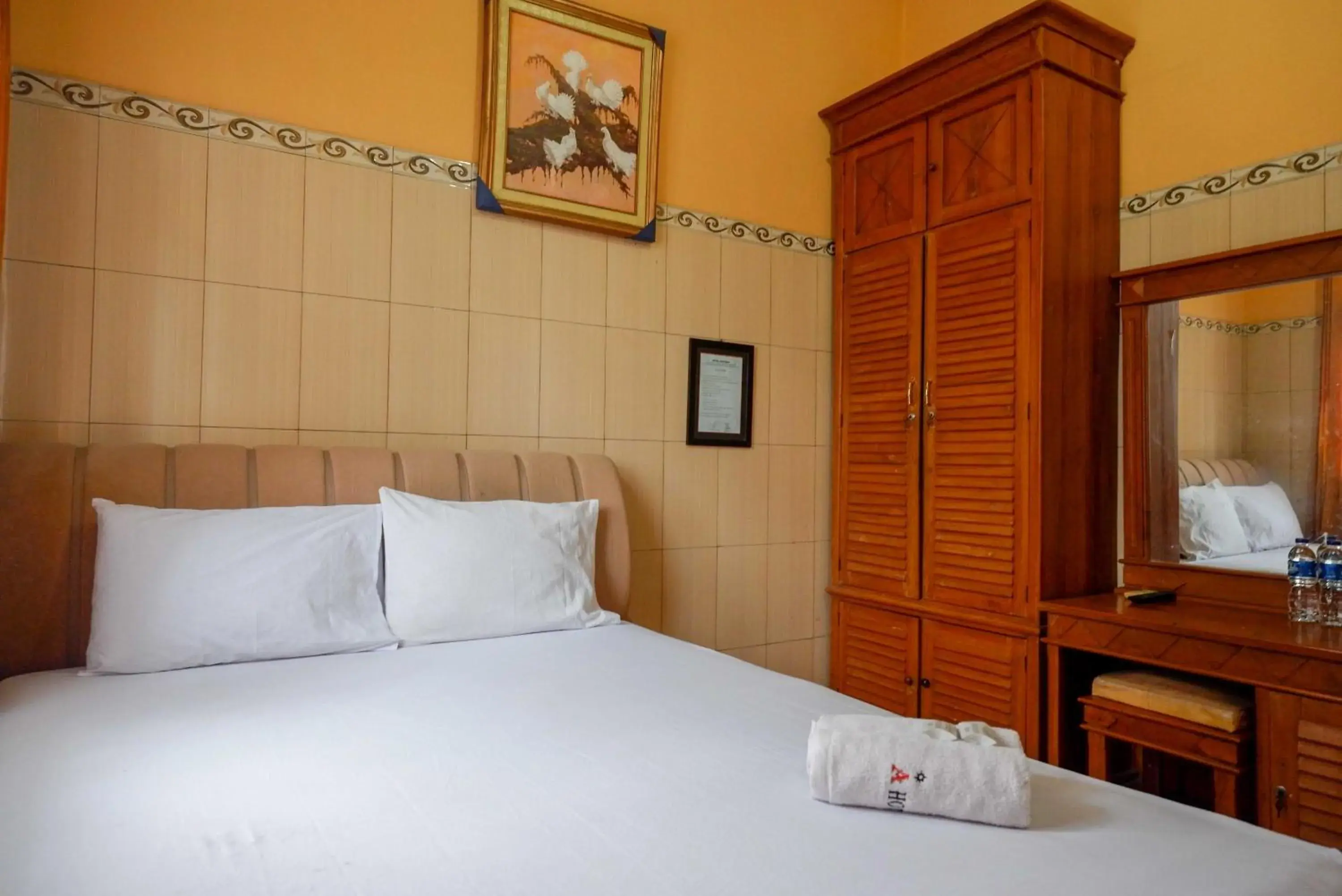 Bed in Urbanview Hotel Anugrah Kendal by RedDoorz Bed in Urbanview Hotel Anugrah Kendal by RedDoorz