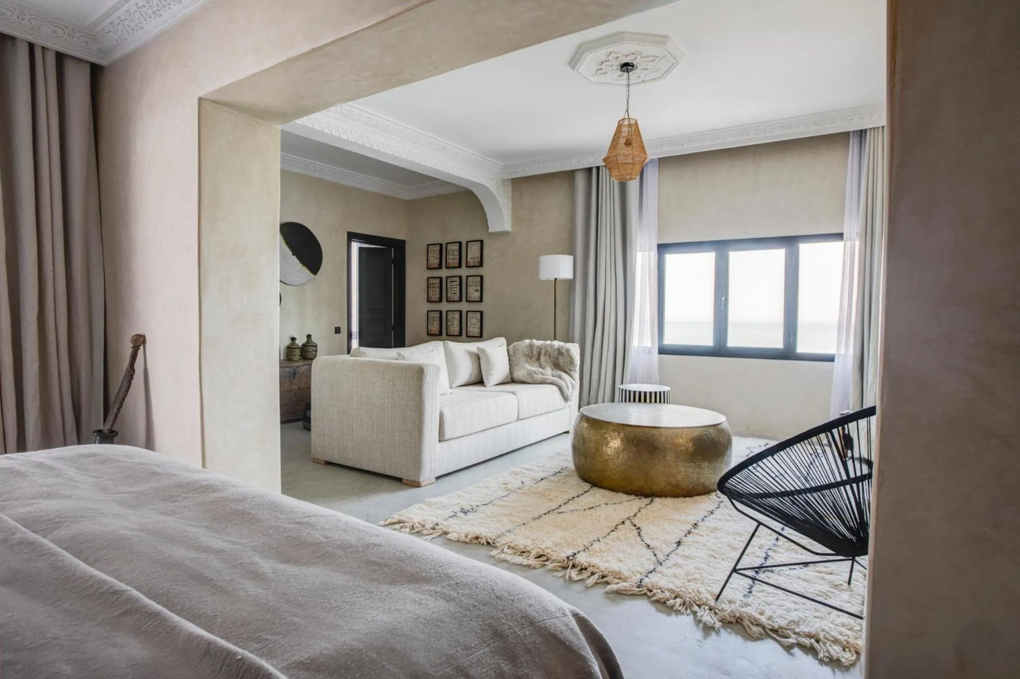 Living room, Bed in Hôtel Oasis Dakhla