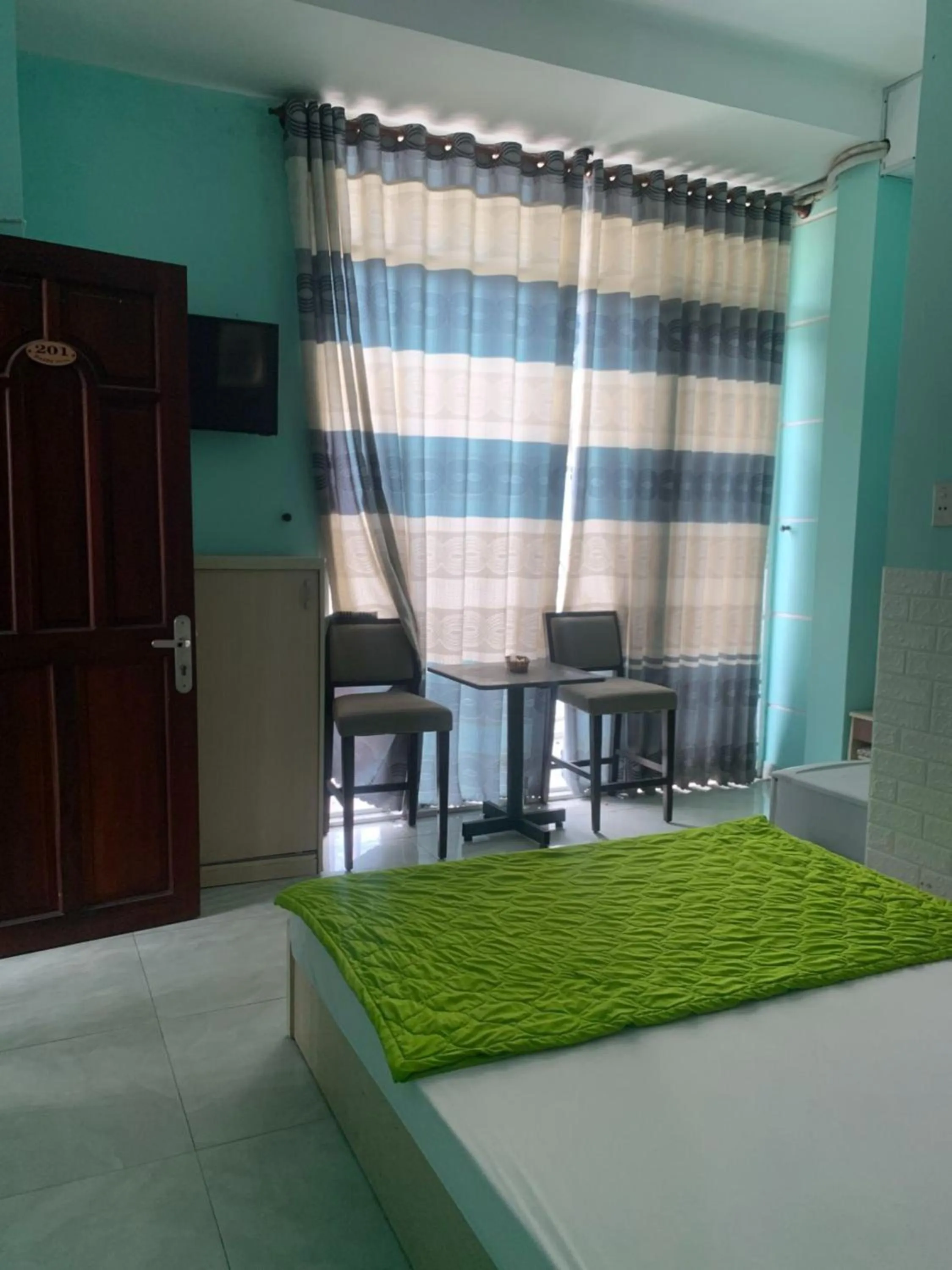 Photo of the whole room in Happy Hotel Binh Tan