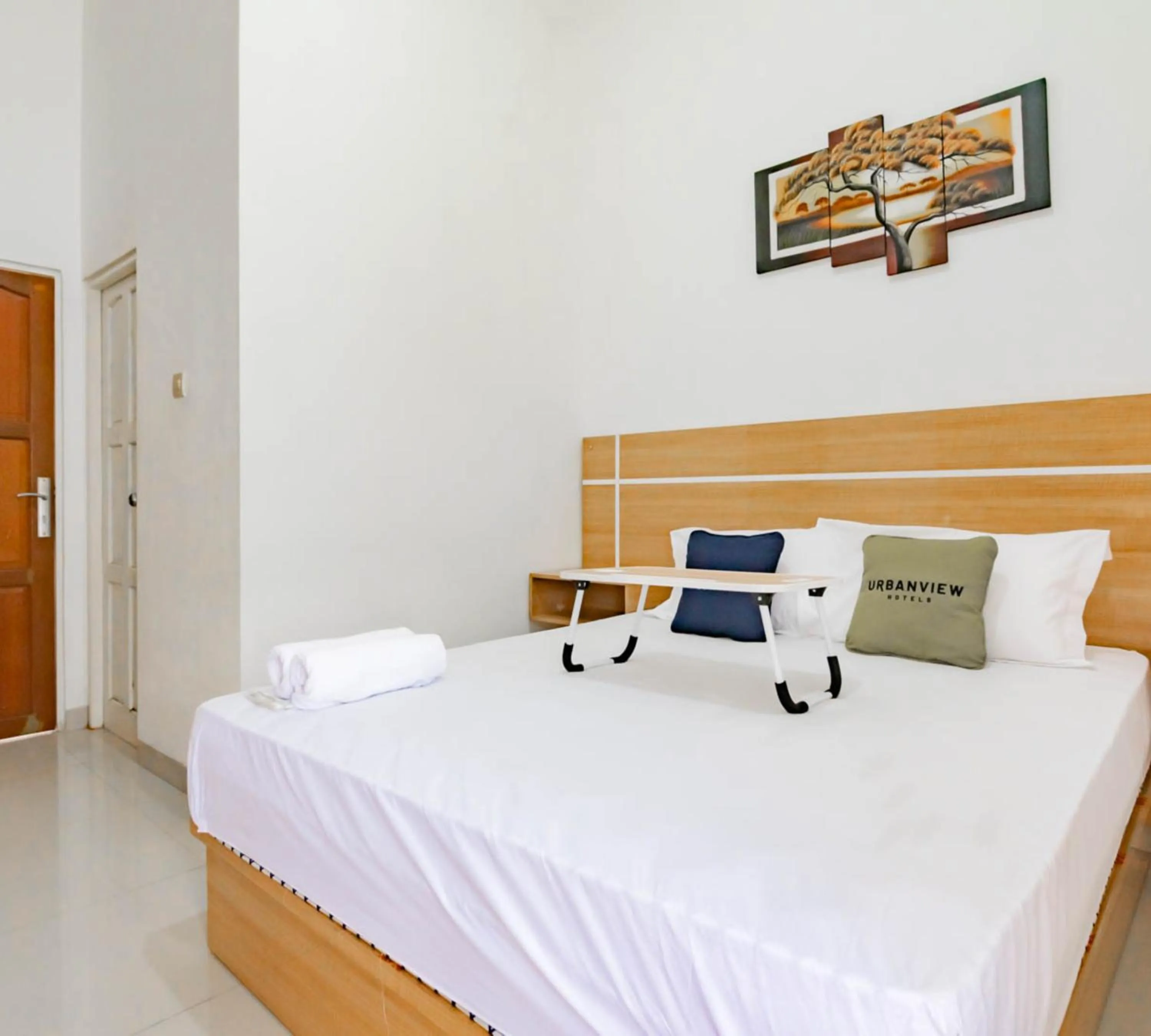 Bedroom, Bed in Urbanview Hotel Bundaran Besar Palangkaraya by RedDoorz