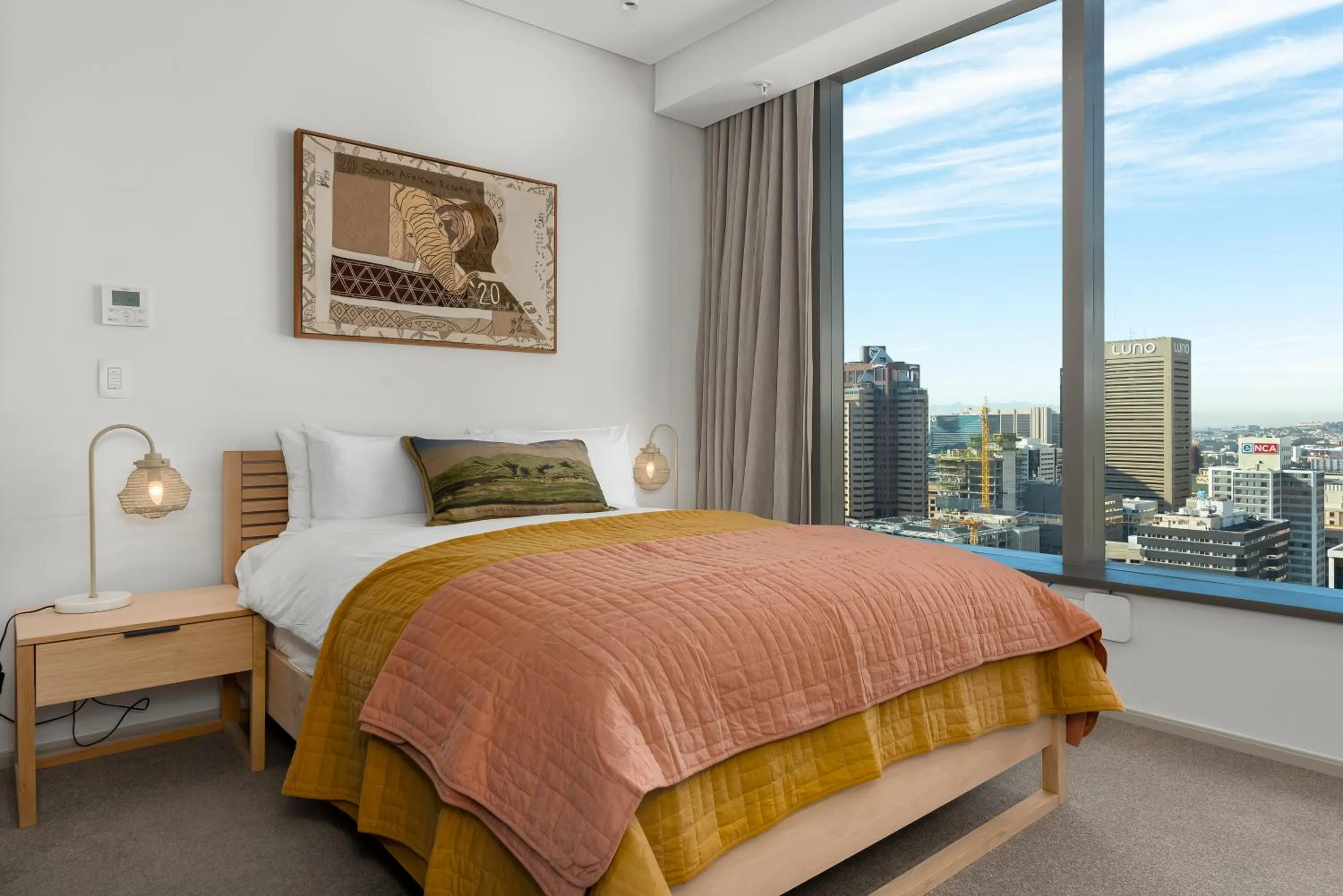 Bed in 117 on Strand Luxury Apartments