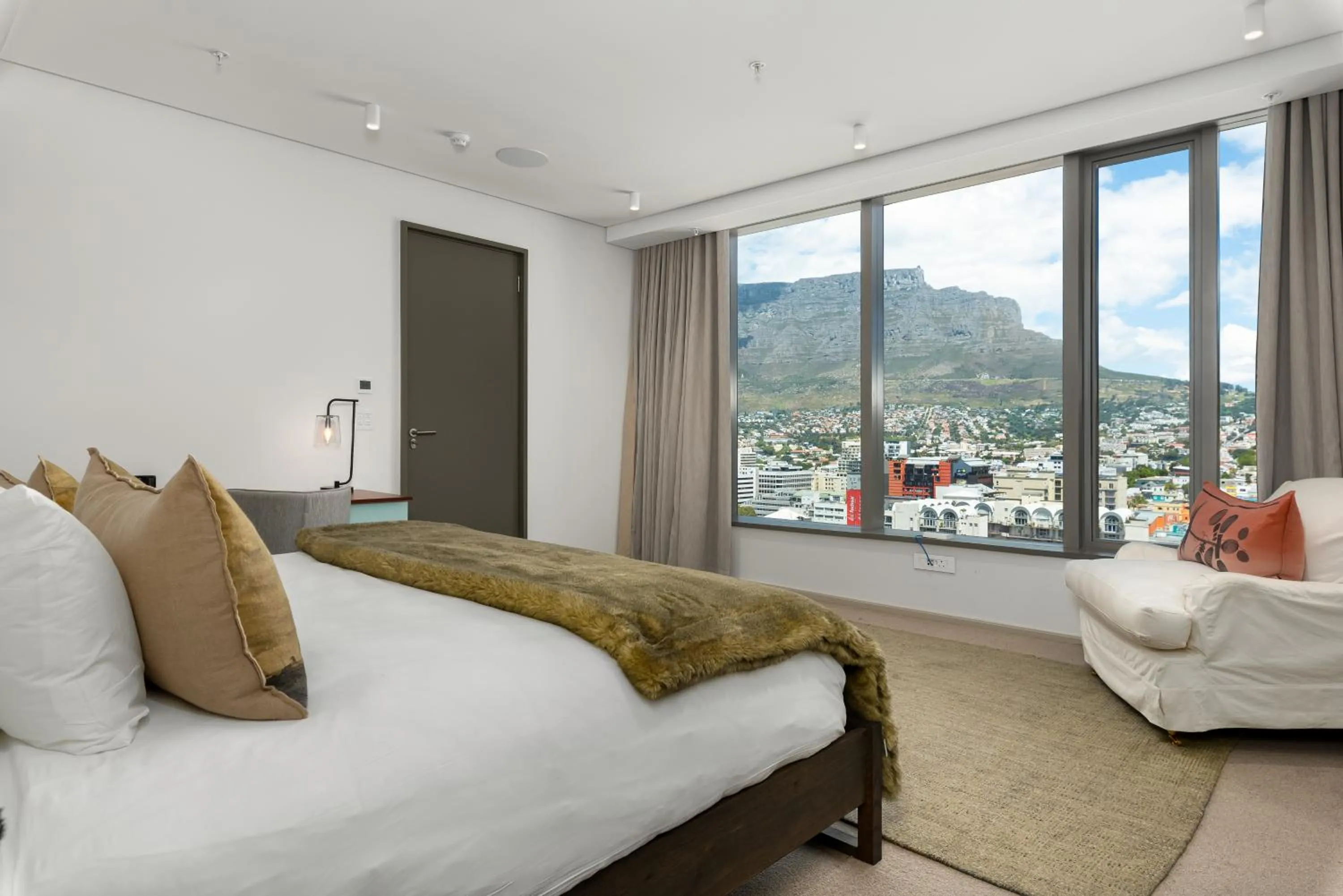 Bed in 117 on Strand Luxury Apartments