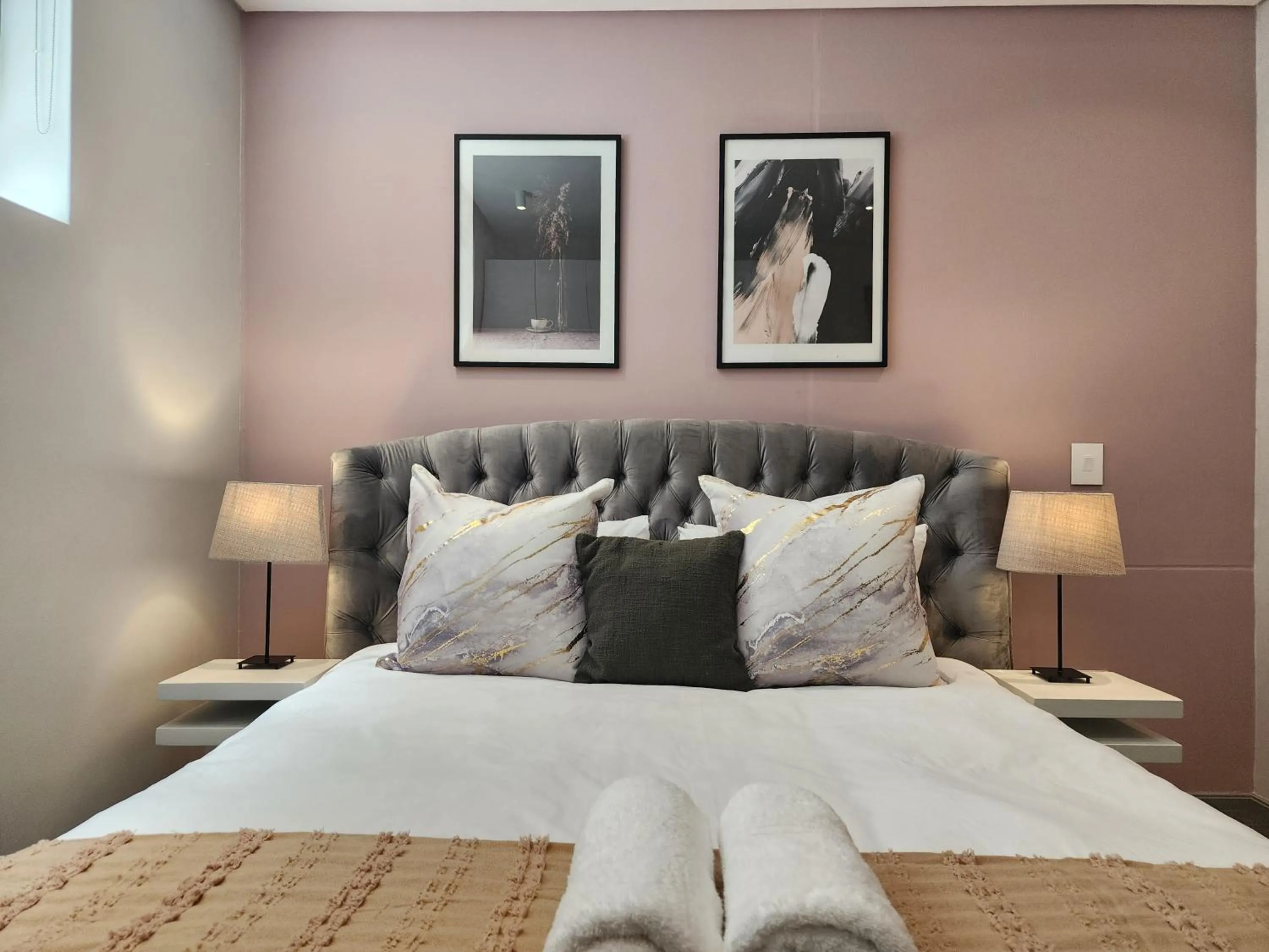 Bed in 117 on Strand Luxury Apartments