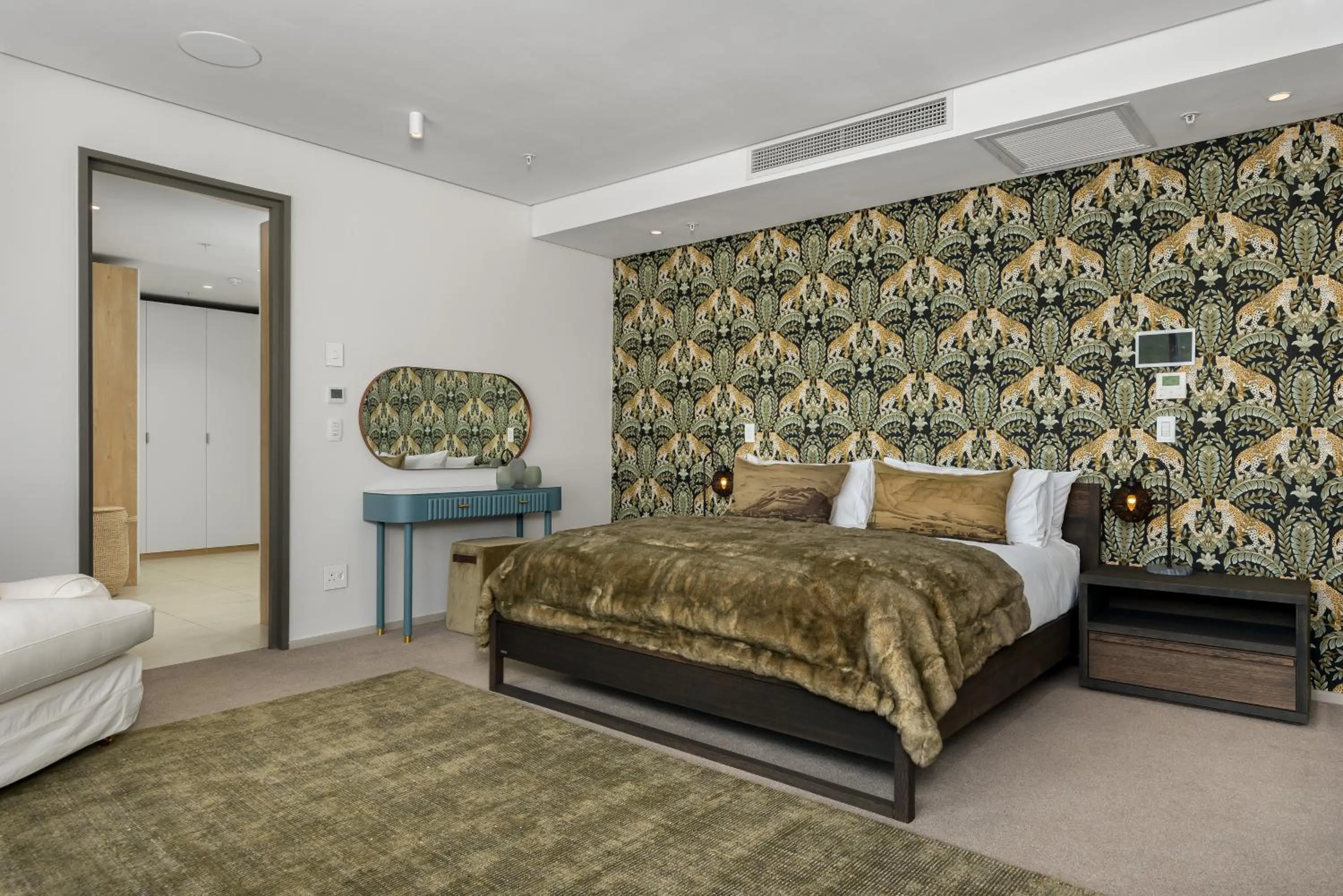 Bed in 117 on Strand Luxury Apartments