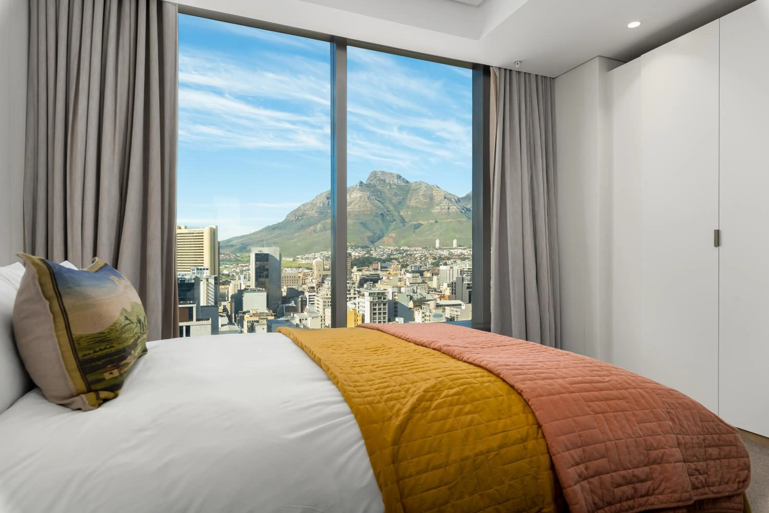 Bed in 117 on Strand Luxury Apartments