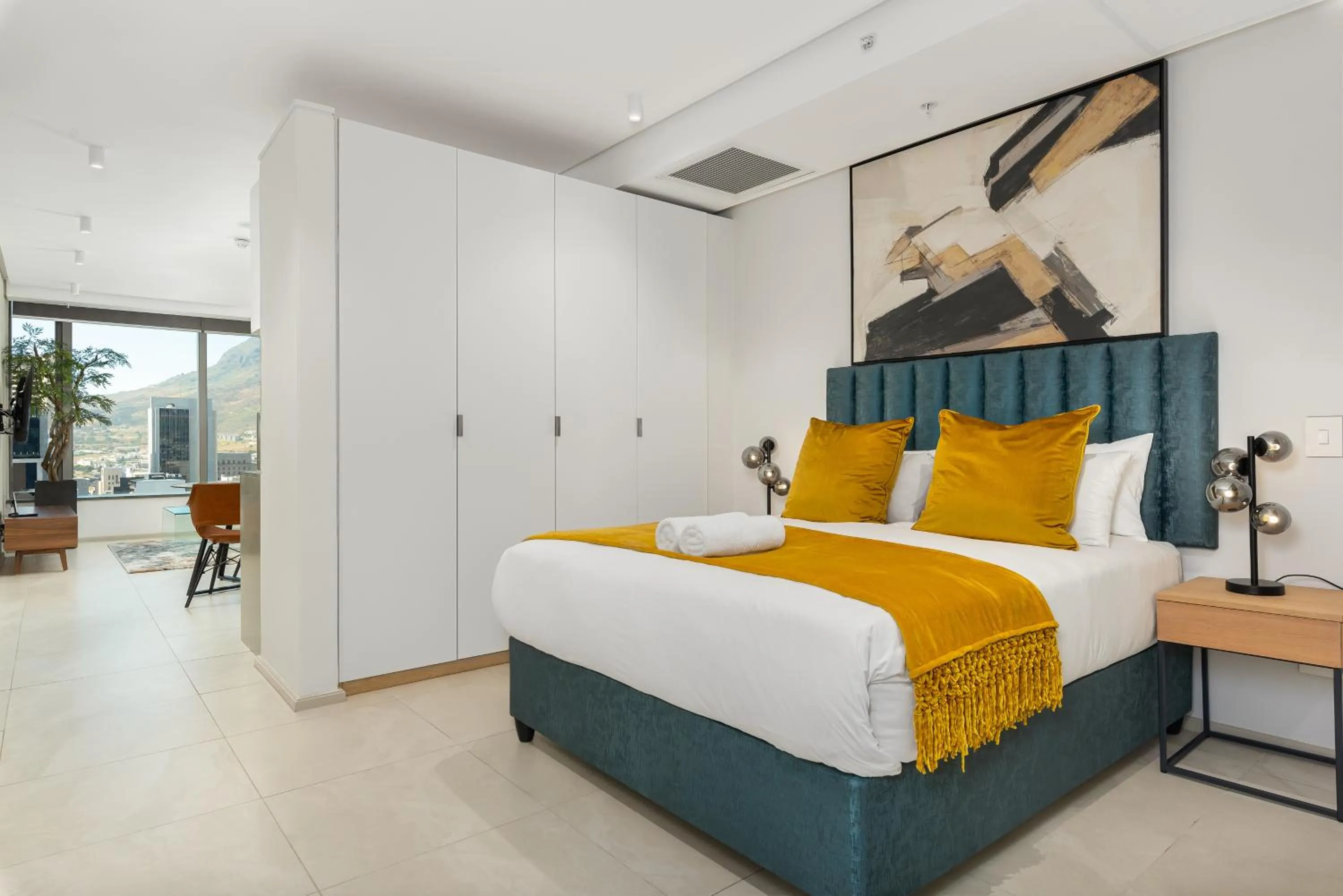Bed in 117 on Strand Luxury Apartments