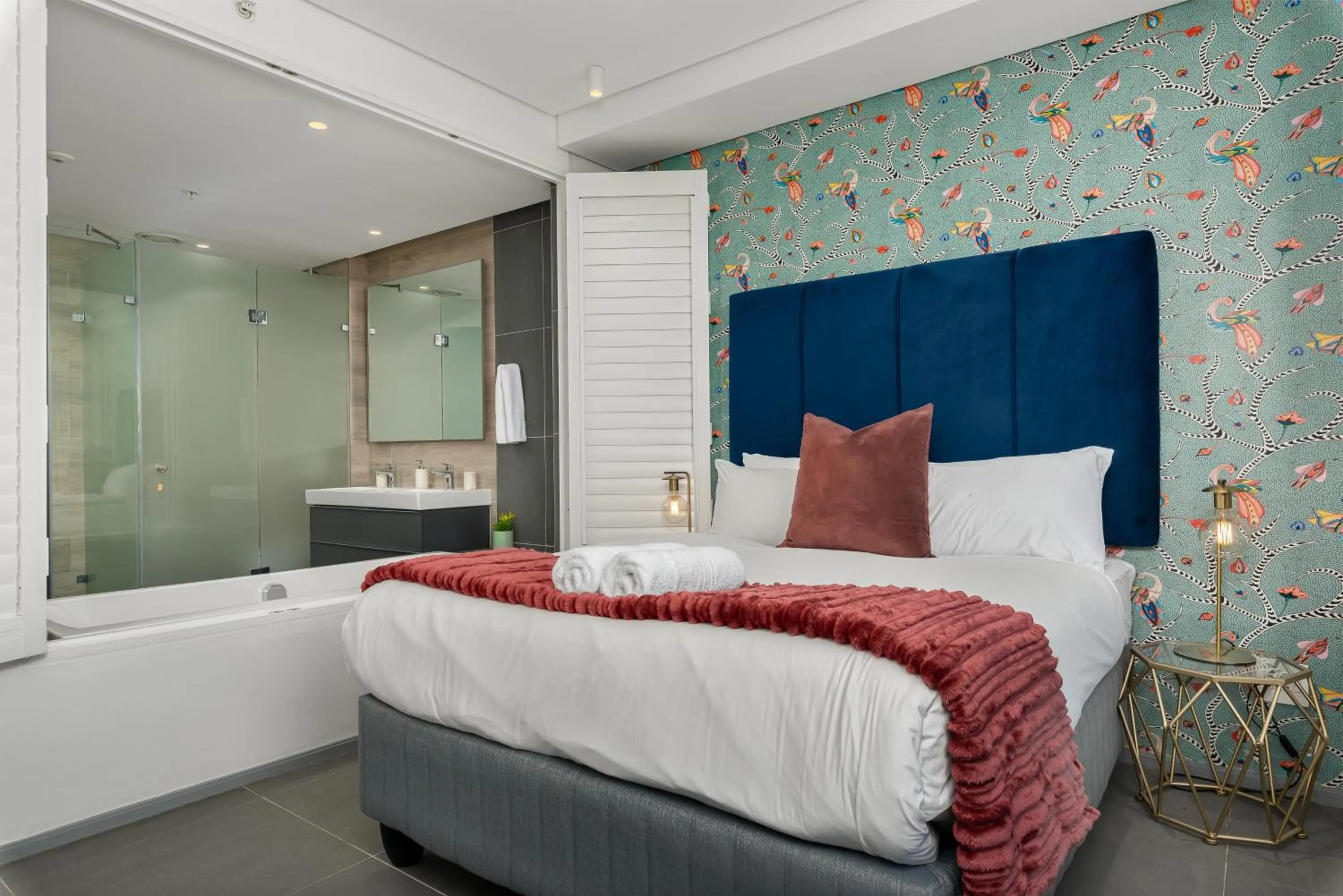 Bed in 117 on Strand Luxury Apartments