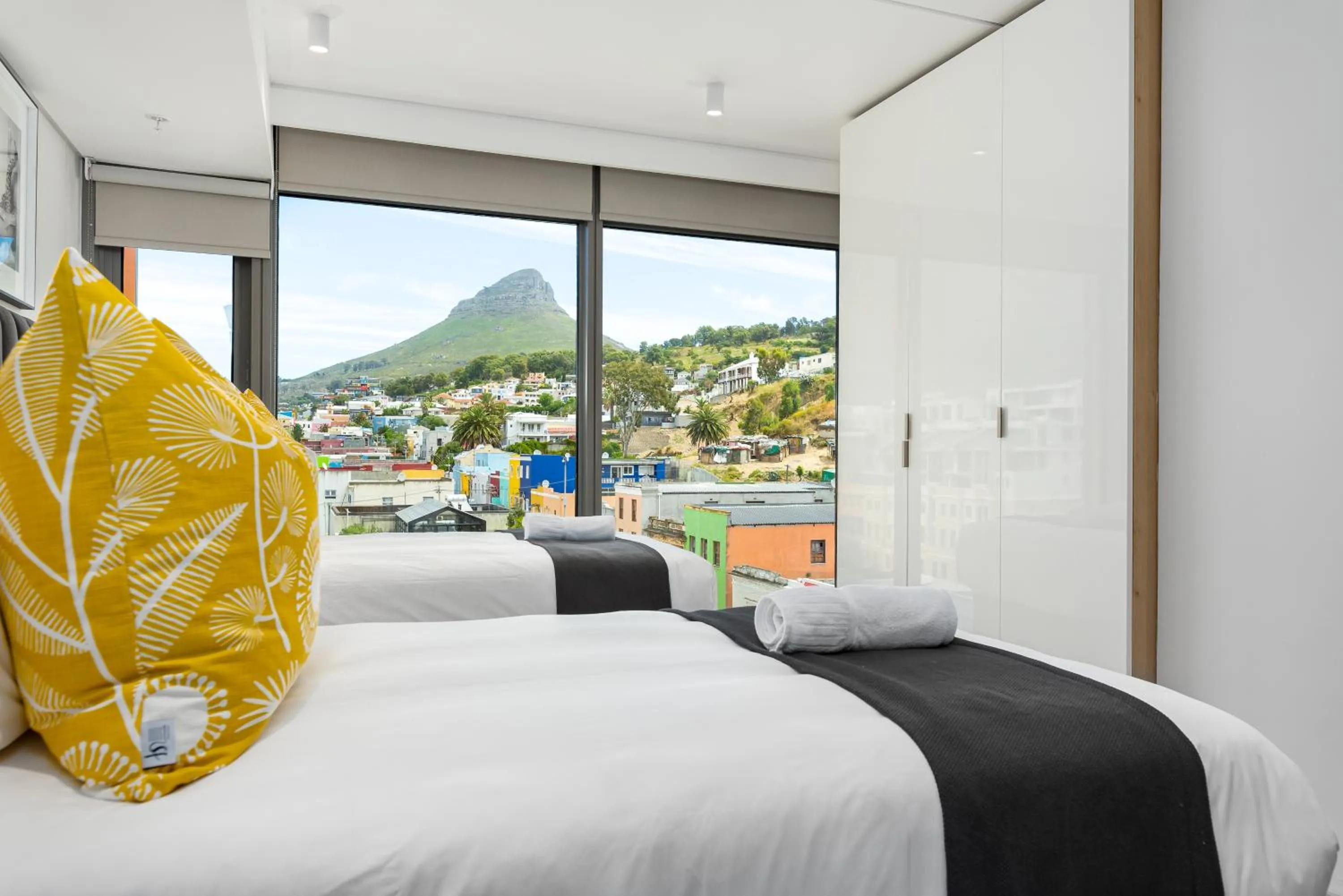 Bed in 117 on Strand Luxury Apartments