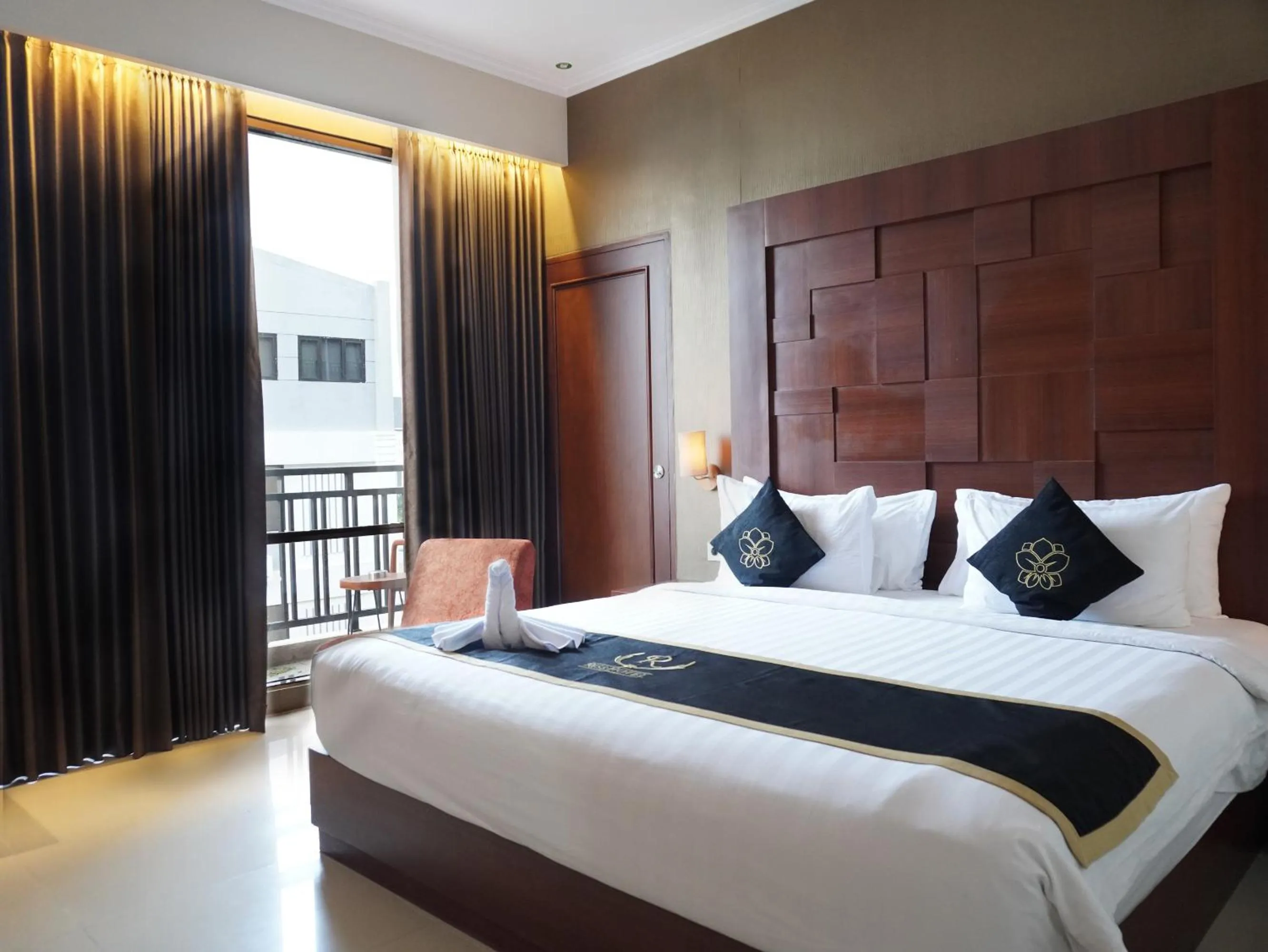 Bed in Riss Hotel Malioboro