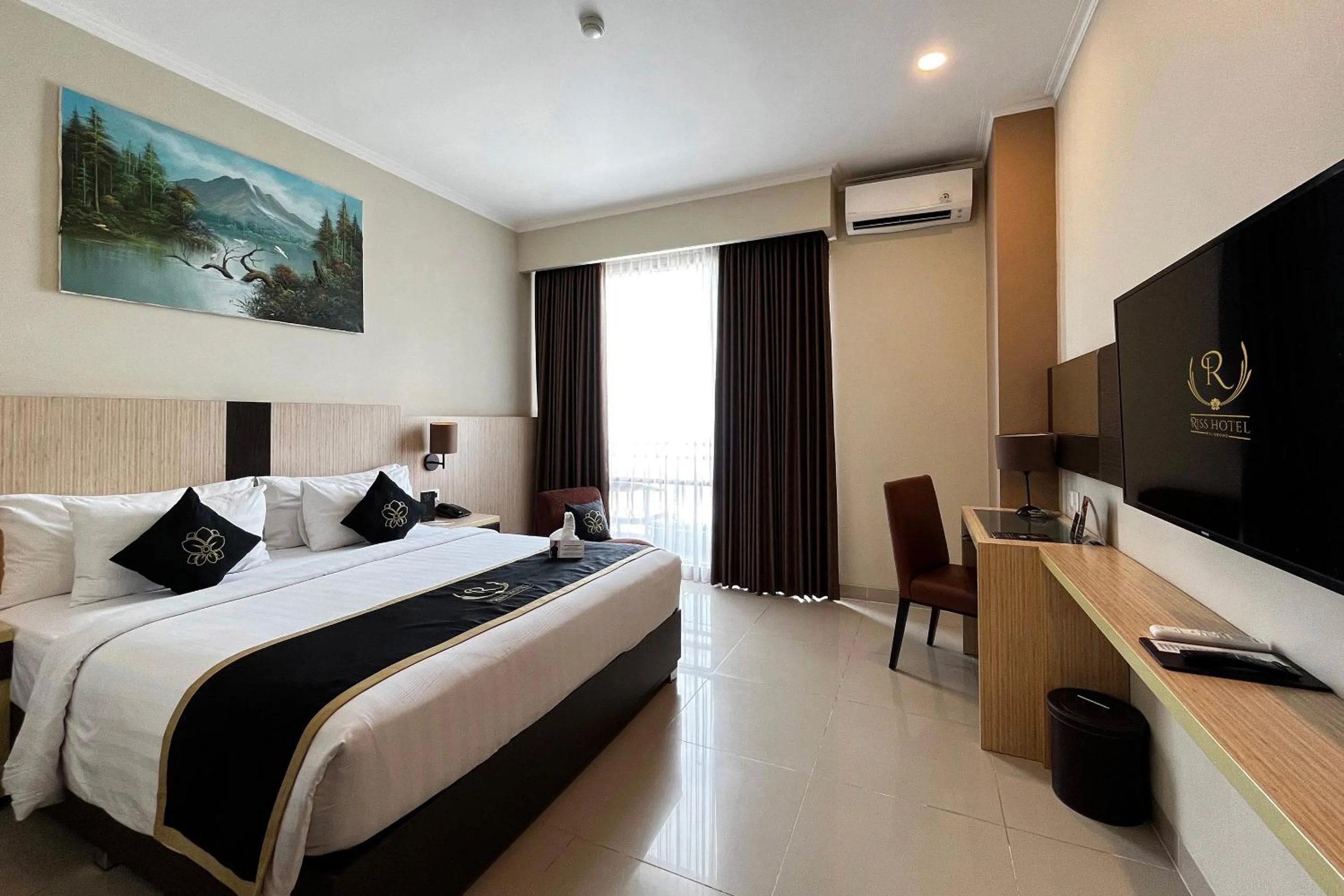 Bed in Riss Hotel Malioboro