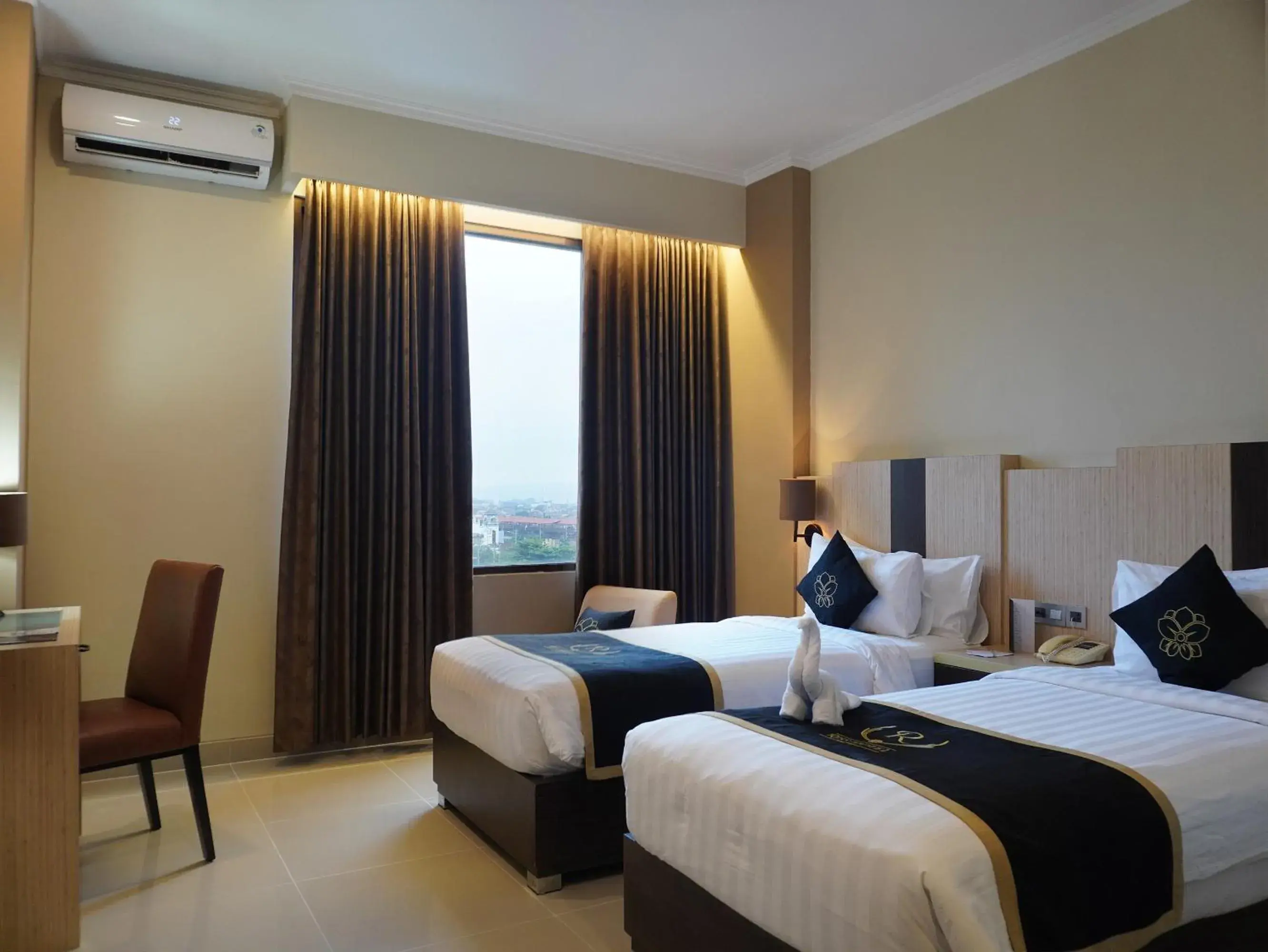 Bed in Riss Hotel Malioboro Bed in Riss Hotel Malioboro