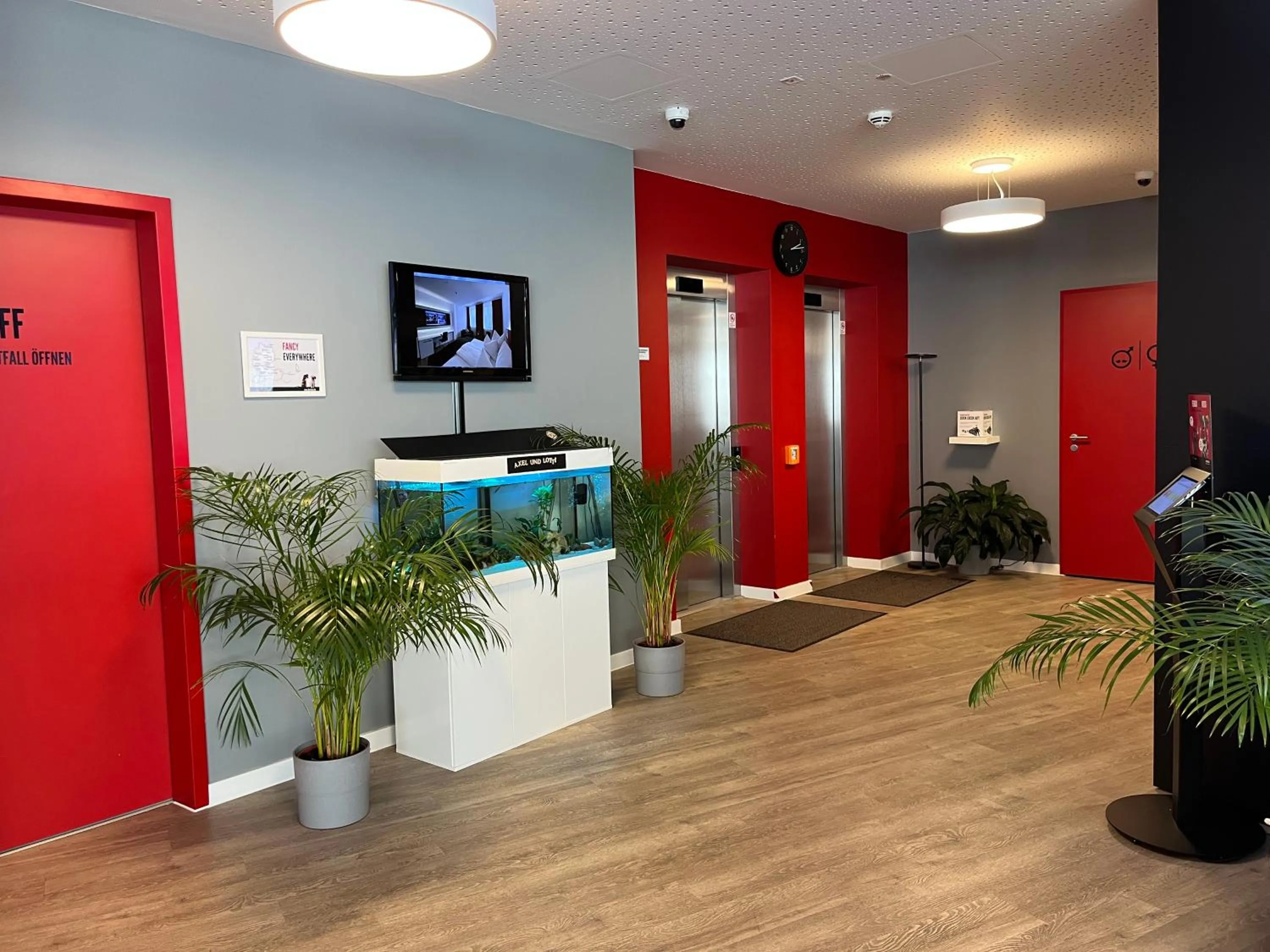 Lobby or reception in DORMERO Hotel Hof