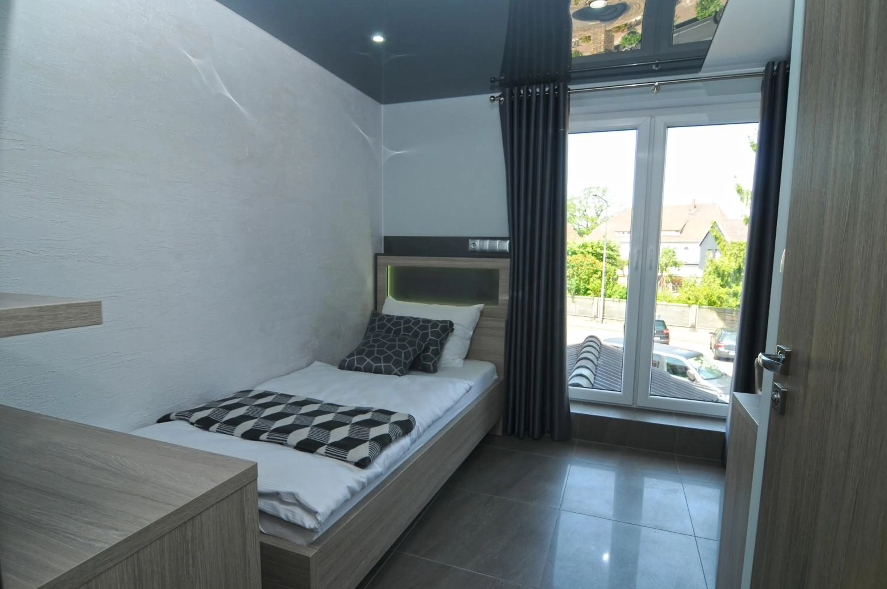 Bed in Nanis Hotel & Appartements