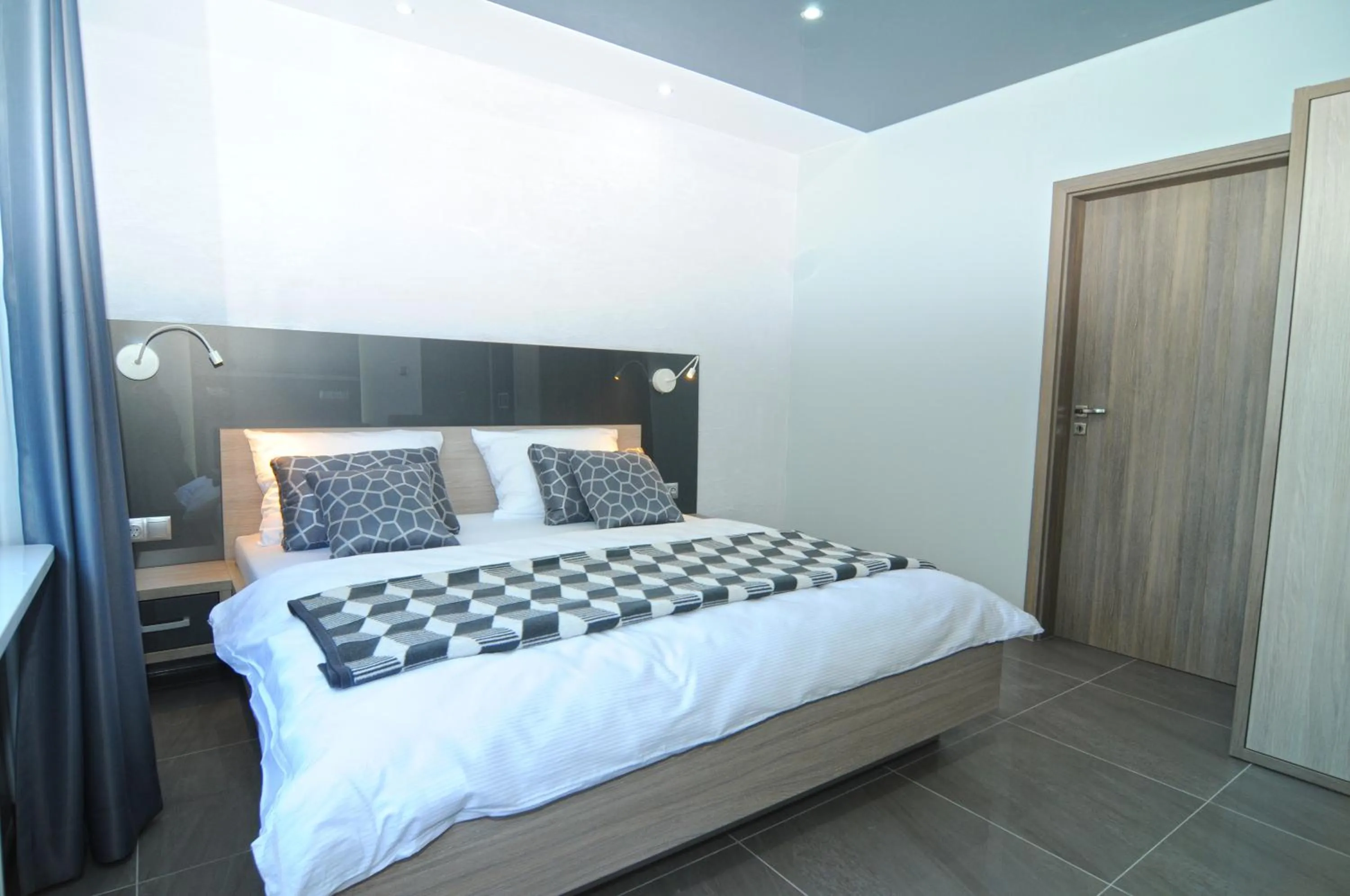 Bed in Nanis Hotel & Appartements