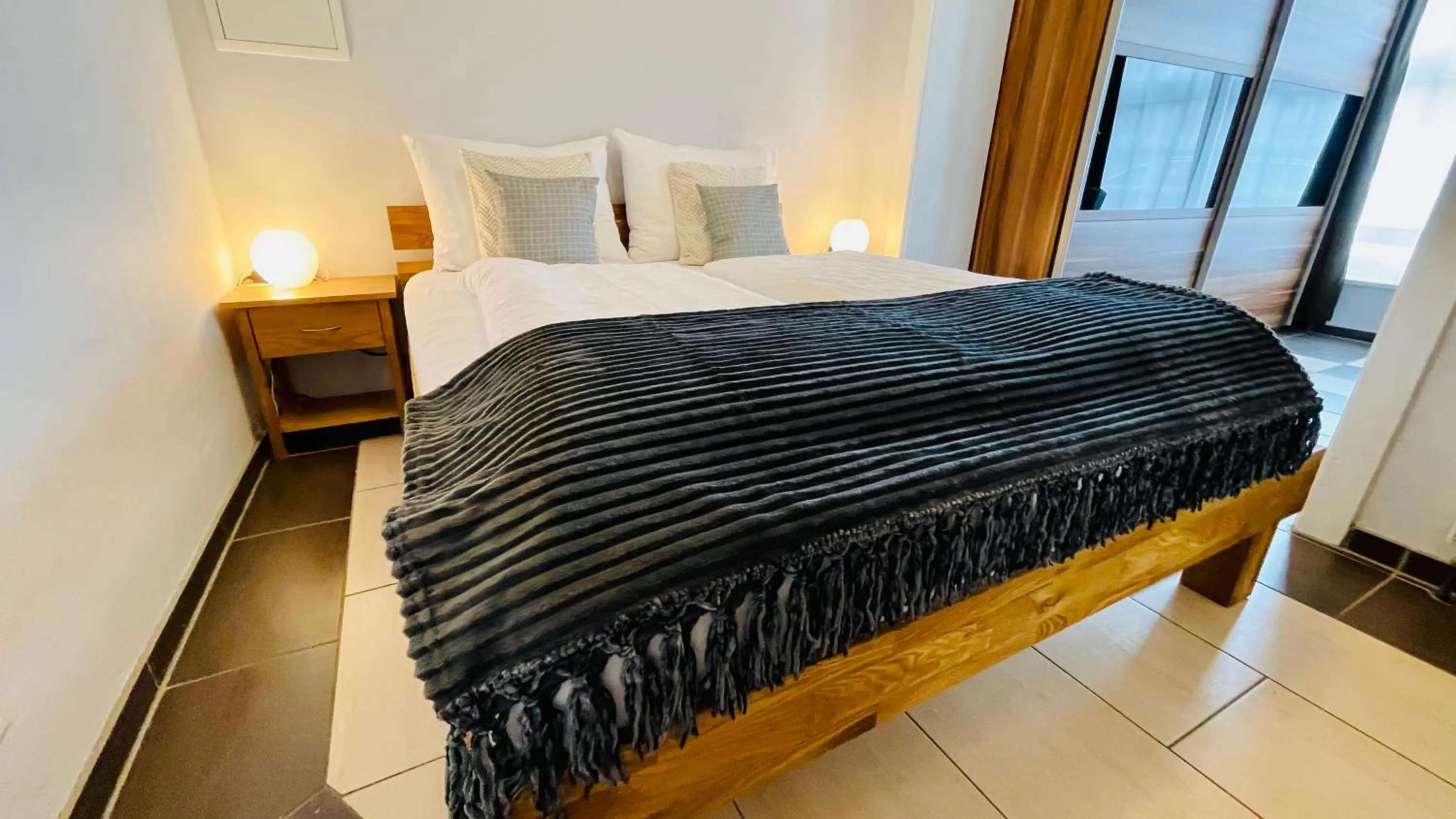 Bed in Nanis Hotel & Appartements