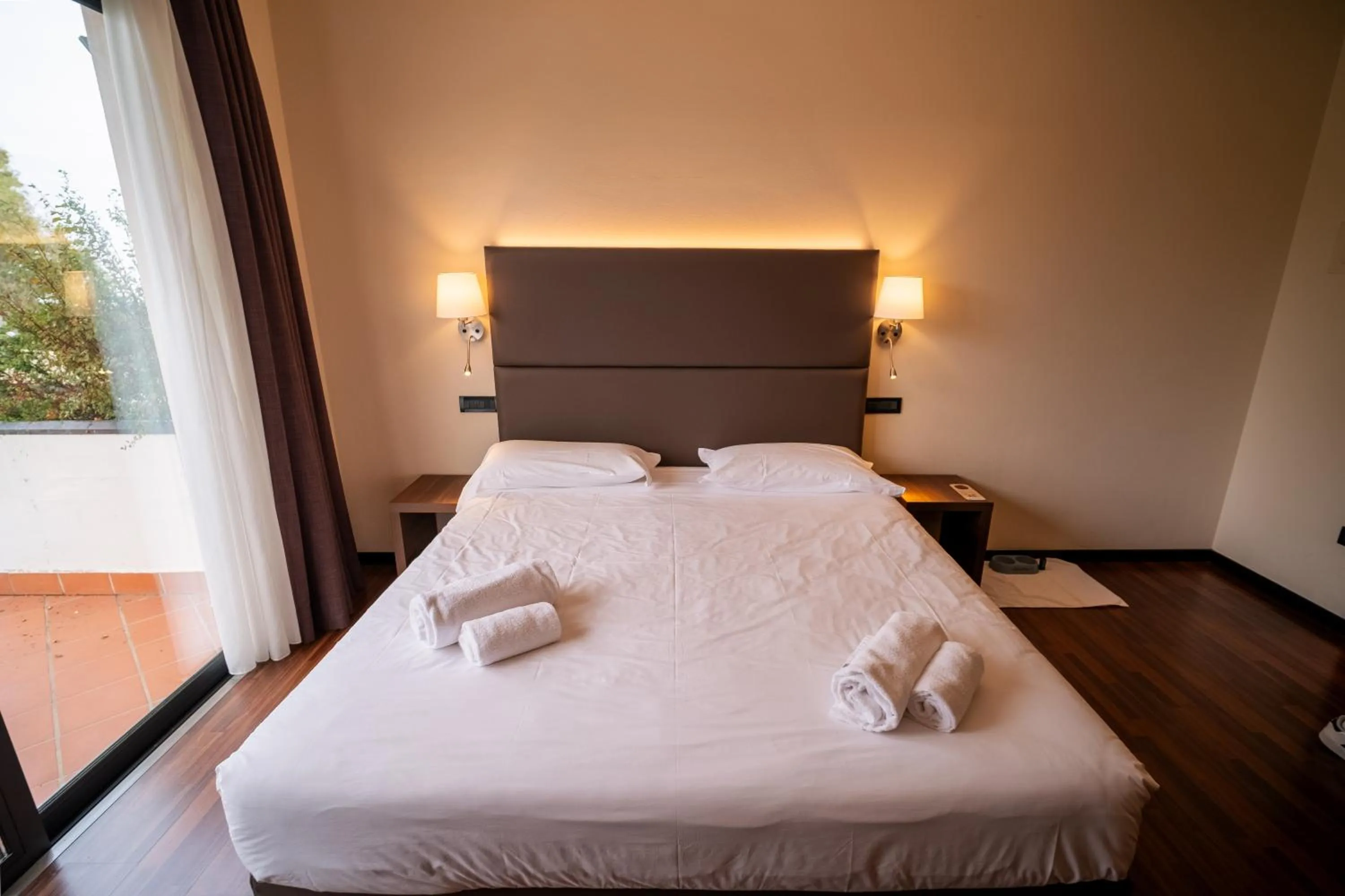 Bed in Yachting Hotel Mistral