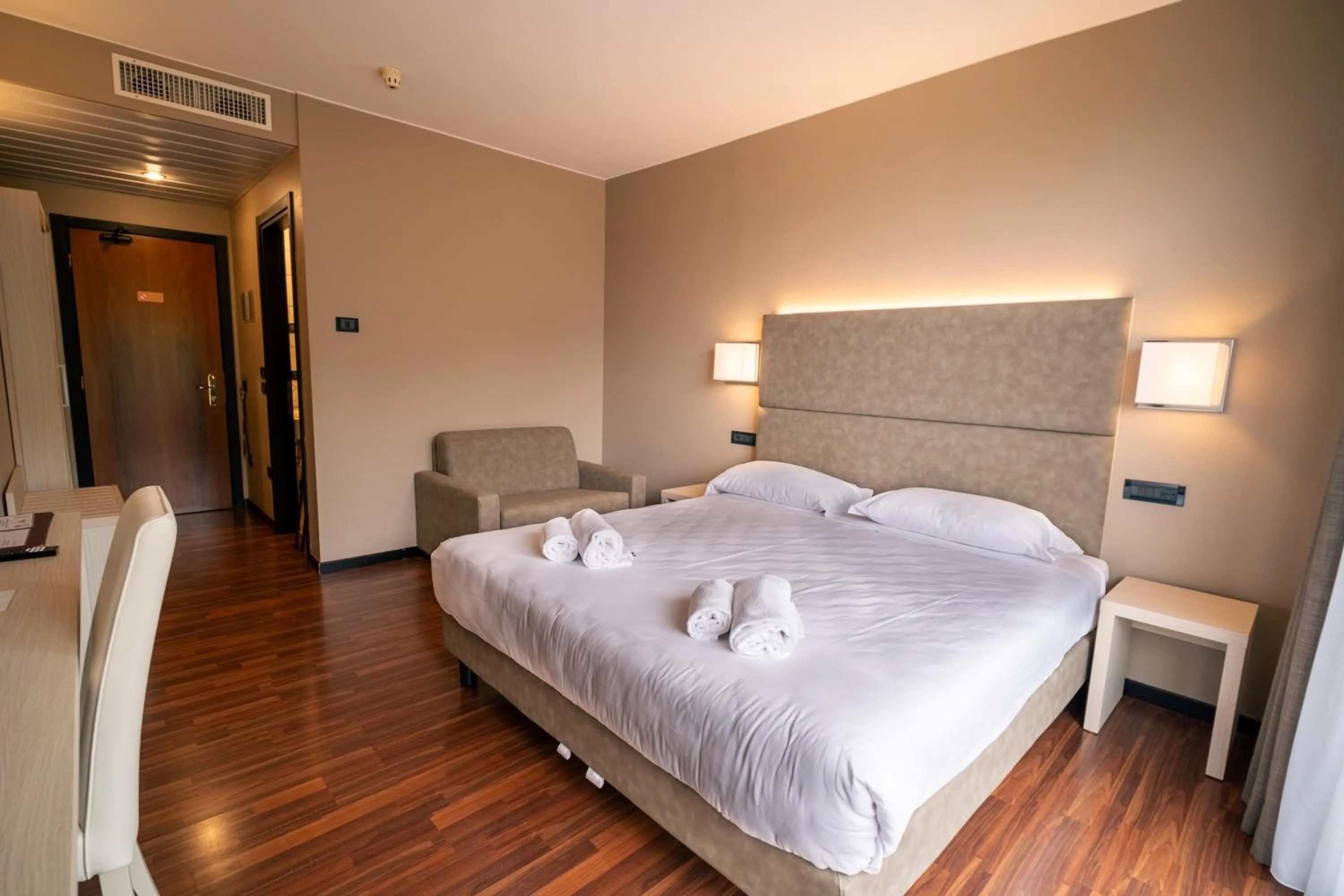 Bed in Yachting Hotel Mistral