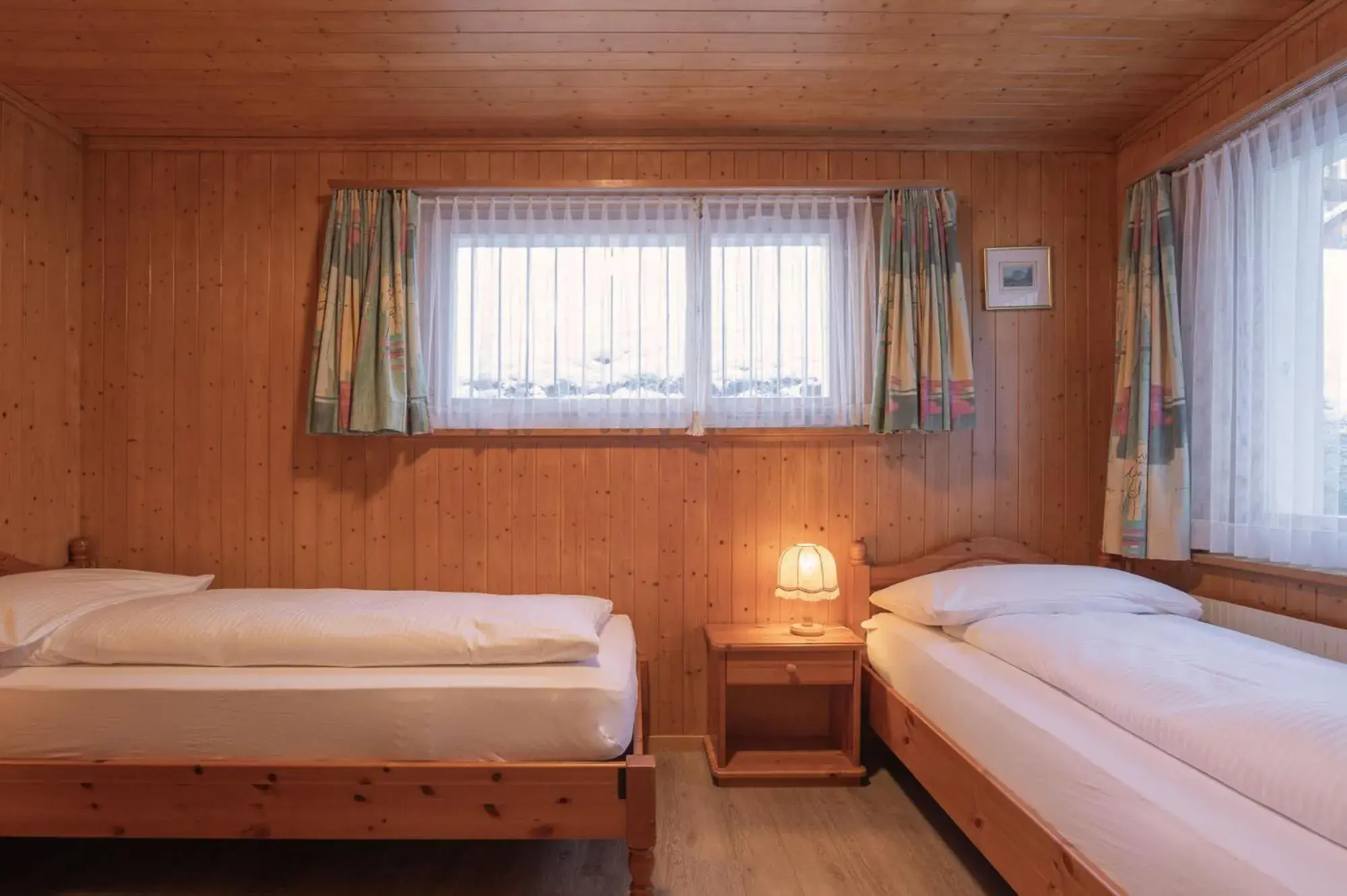 Bedroom, Bed in Apartment Jungfrau Lodge Bedroom, Bed in Apartment Jungfrau Lodge