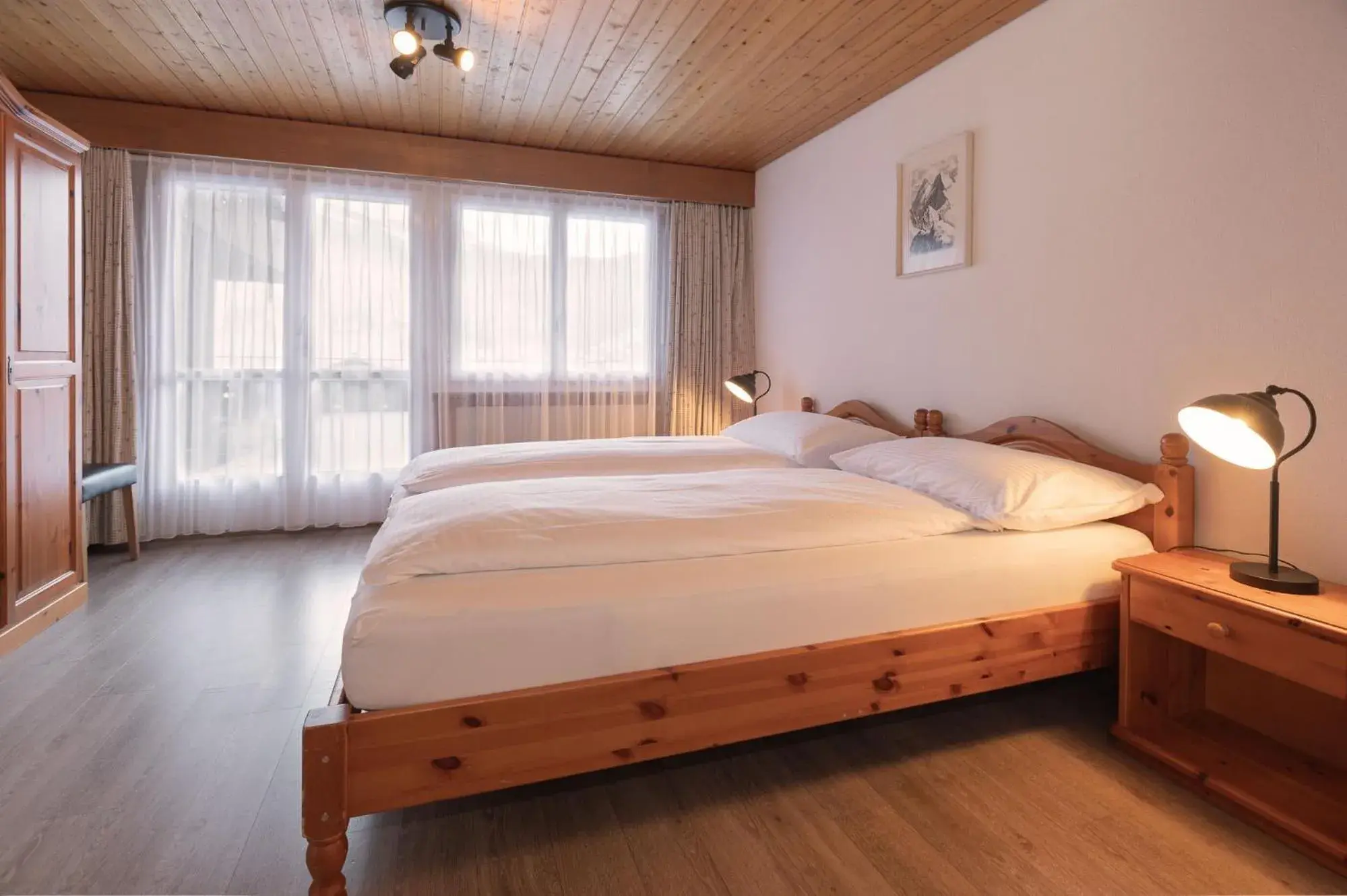 Bedroom, Bed in Apartment Jungfrau Lodge Bedroom, Bed in Apartment Jungfrau Lodge