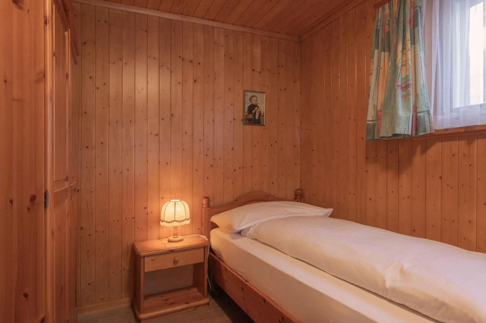 Bedroom, Bed in Apartment Jungfrau Lodge Bedroom, Bed in Apartment Jungfrau Lodge