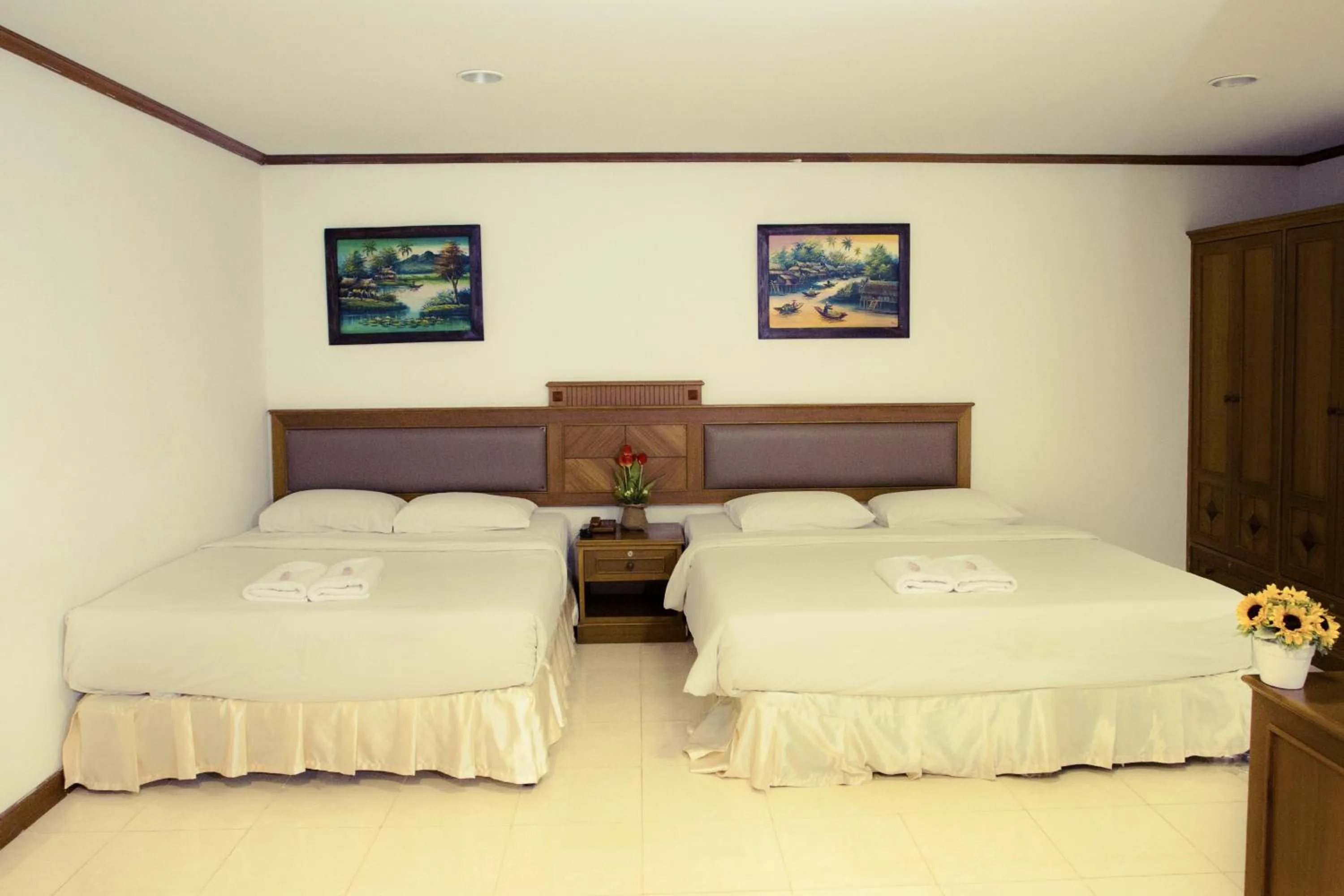 Bed in The Residence Hotel -SHA Extra Plus
