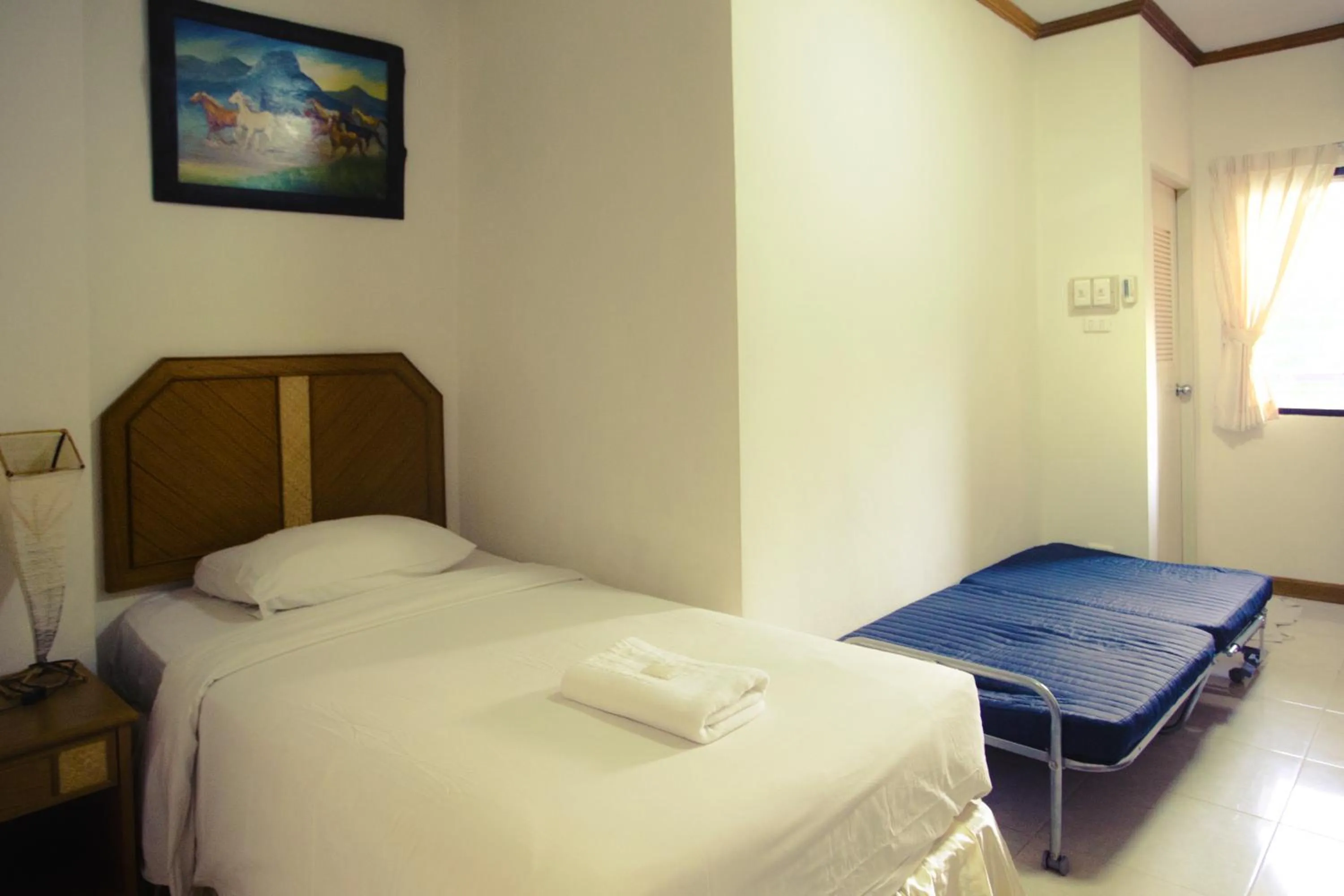 Bed in The Residence Hotel -SHA Extra Plus